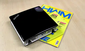On the desk, the Zotac IQ01 Mini-PC takes up about as much space as our magazine.