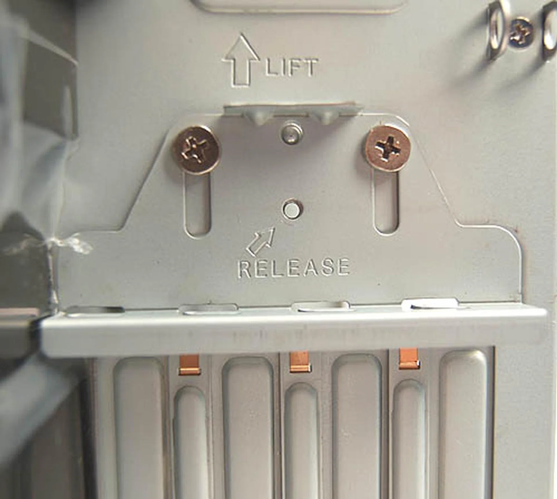 To install any card into the expansion slot requires a screwdriver. Tool-free is sadly not an option. You'll have to loosen the screws and pull the locking bar upwards.