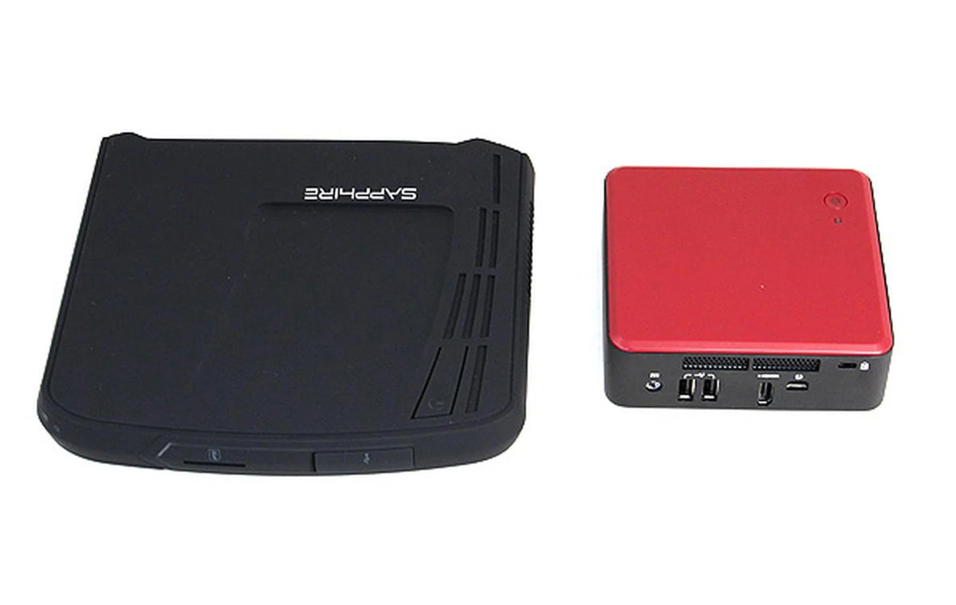 Here's the Sapphire Edge VS8 juxtaposed along the Intel NUC Mini-PC. In terms of outright volume, the Intel NUC Mini-PC is the more compact of the two. However, the Edge VS8's slim profile and light weight makes it supremely portable still.