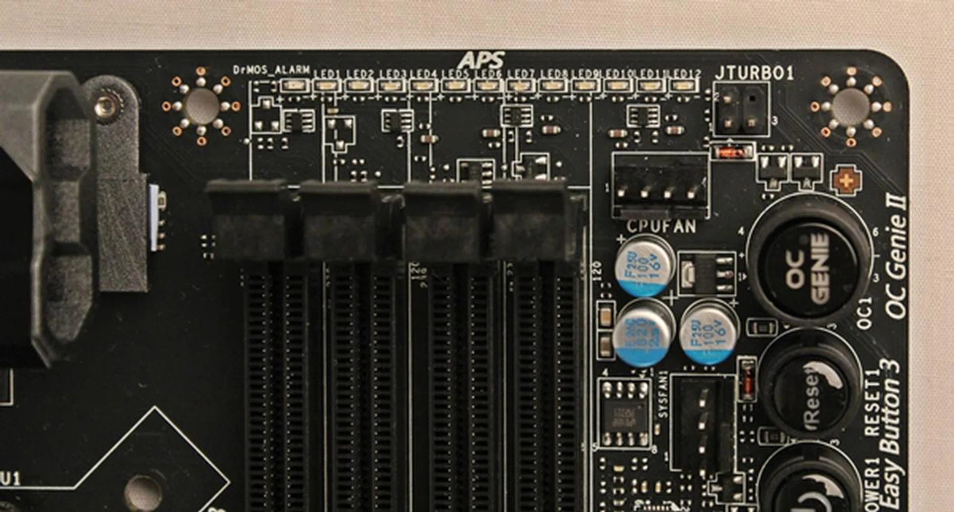 According to the manual, the DrMOS alarm LED will light up when the MOSFET ICs are overheated.