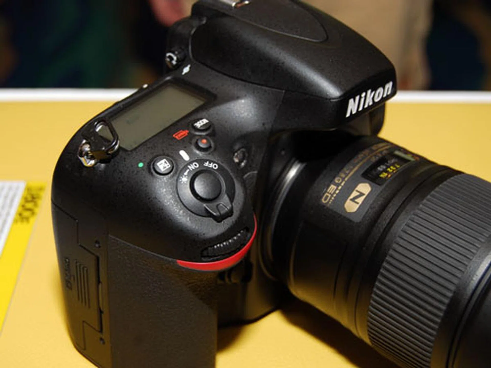 The D800 possesses a dedicated movie record button (notice the little red dot).