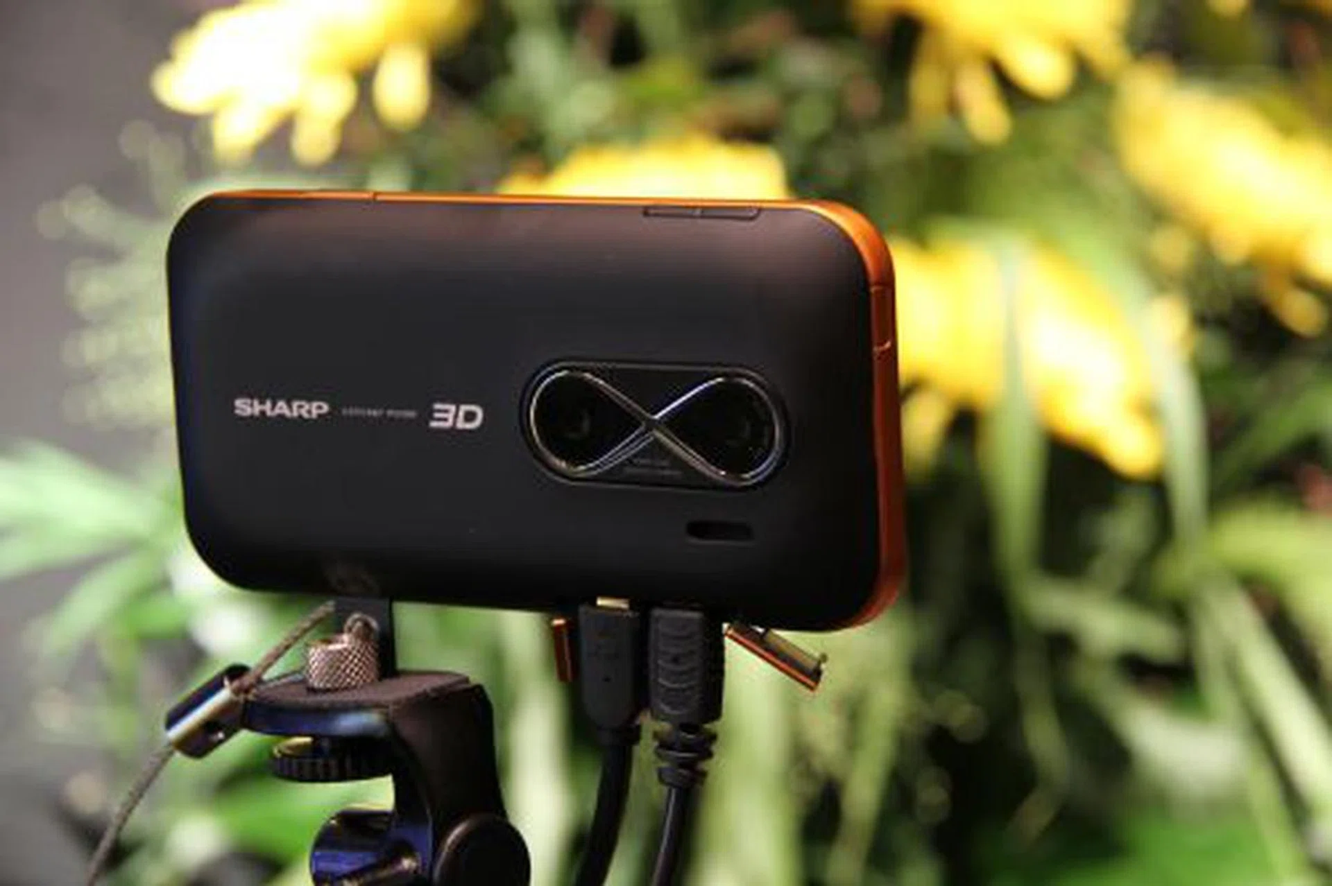 Sharp showcased a concept prototype of a device that can capture 3D images on a portable device here. The screen module is a 3.8" with a 400 x RGB x 480 dot resolution in 3D and doubles to an 800 x RGB x 480 dot resolution in 2D. When viewed, users do not need 3D glasses but should stand about 30 cm away from the screen for optimal viewing. Besides the 3.8", another concept was a 10.6" version with a 640 x RGB x 768 3D resolution (50 cm viewing distance). 