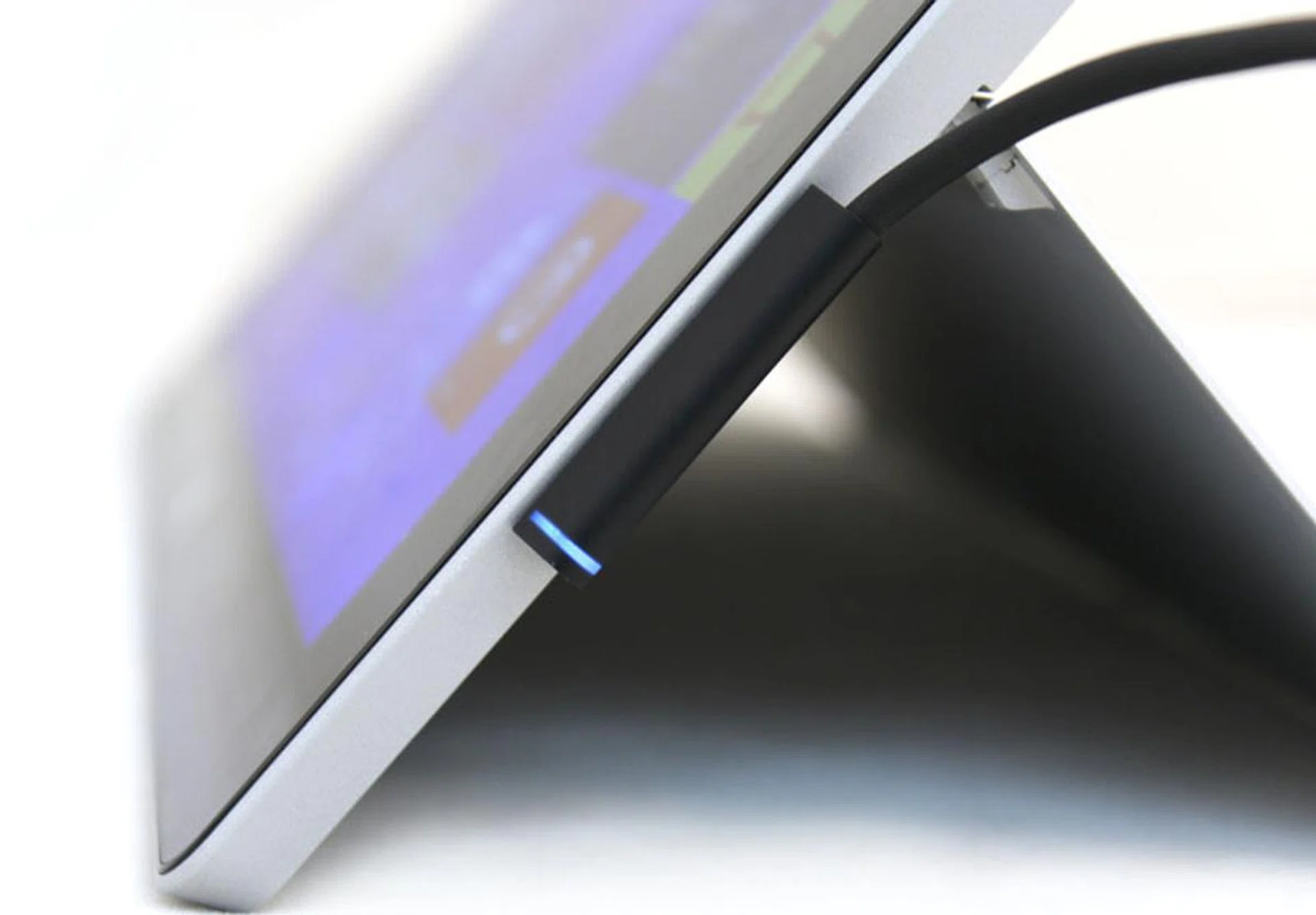 The power connector now fits a bit more securely, and the charging light is also easier to see.