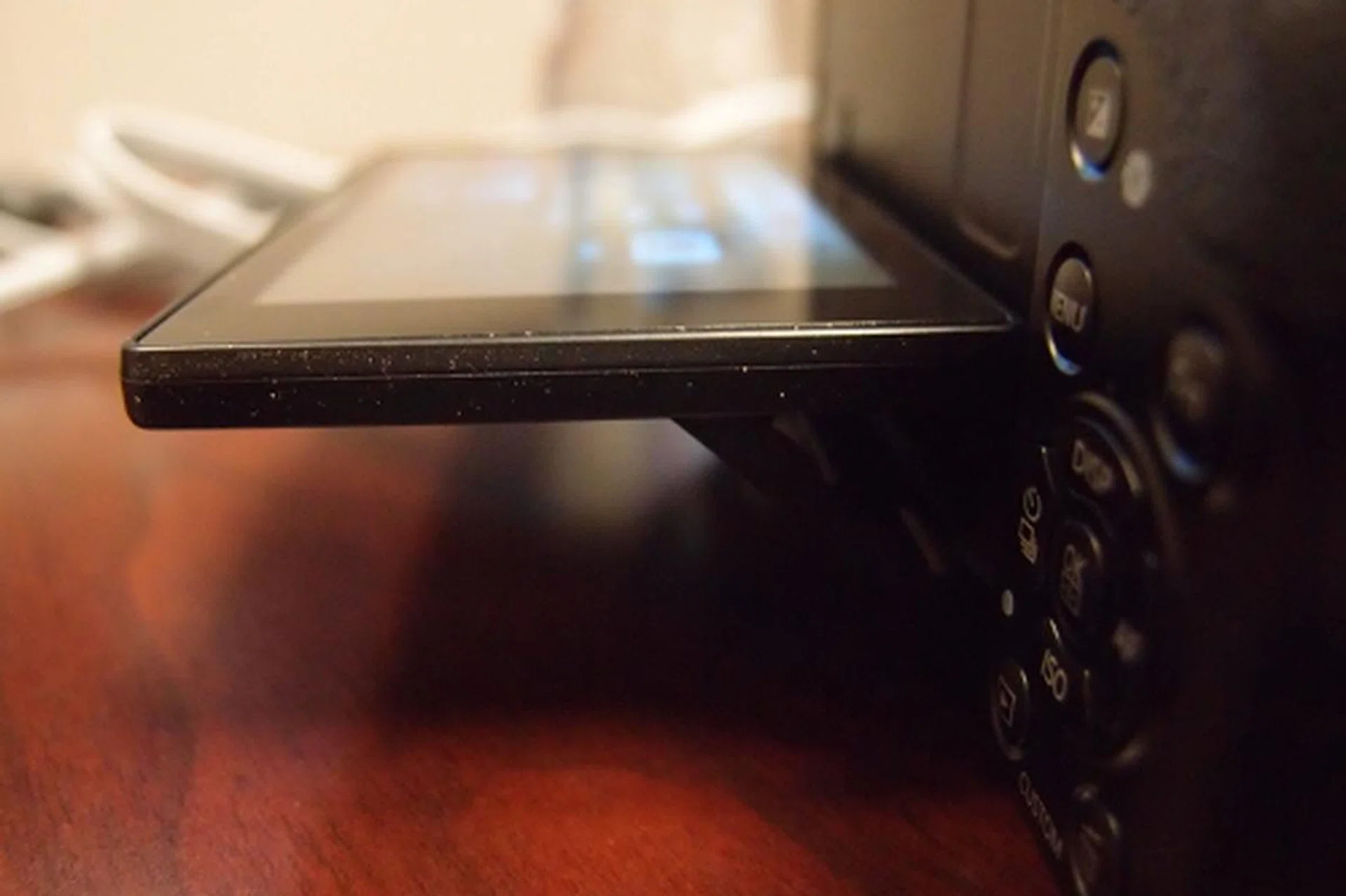 The tilt display makes it easier to take high and low angle shots. You can tilt it up flat at 90 degrees...