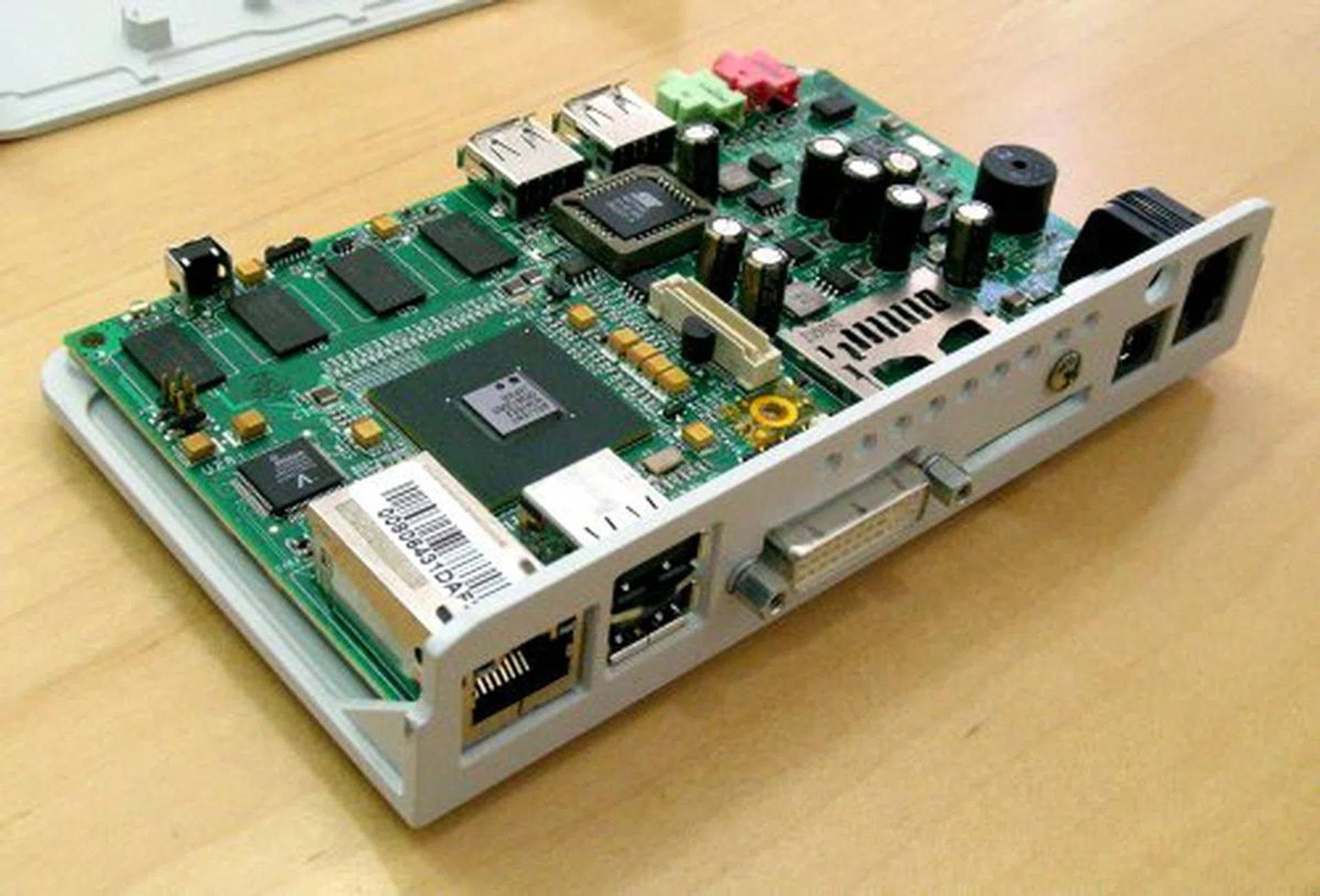 Only the necessities include RJ-45 for LAN, RJ-11 for phone line, DVI output, analog audio and mic plus USB ports for attaching connectivity peripherals like keyboards, mice and network authentication card readers. No external storage devices are supported as that would obviously compromise security of such a system.