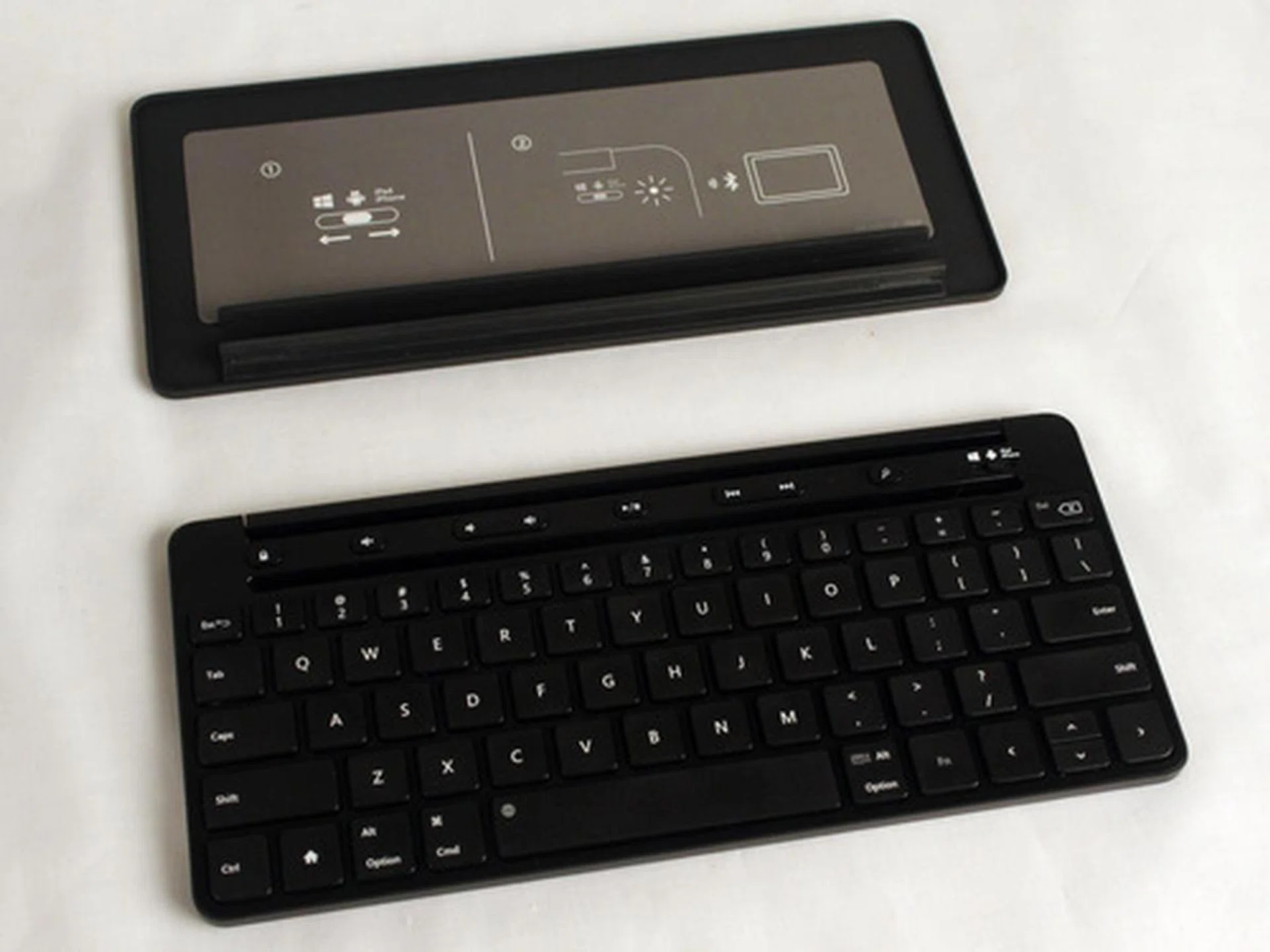 Once detached, the cover's solid enough by itself. The magnets holding the two pieces are extremely strong, so there no worries that the cover would detach by itself.