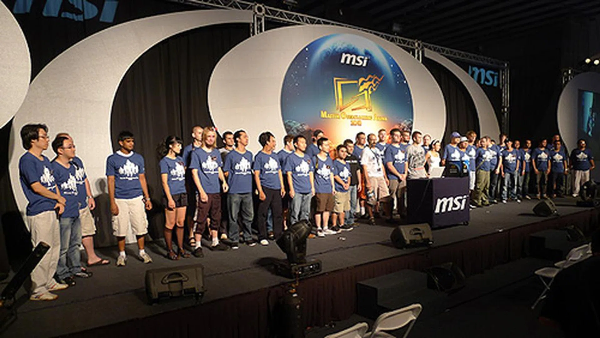 Giorgioprimo and the contestants up on the stage for a group shot.