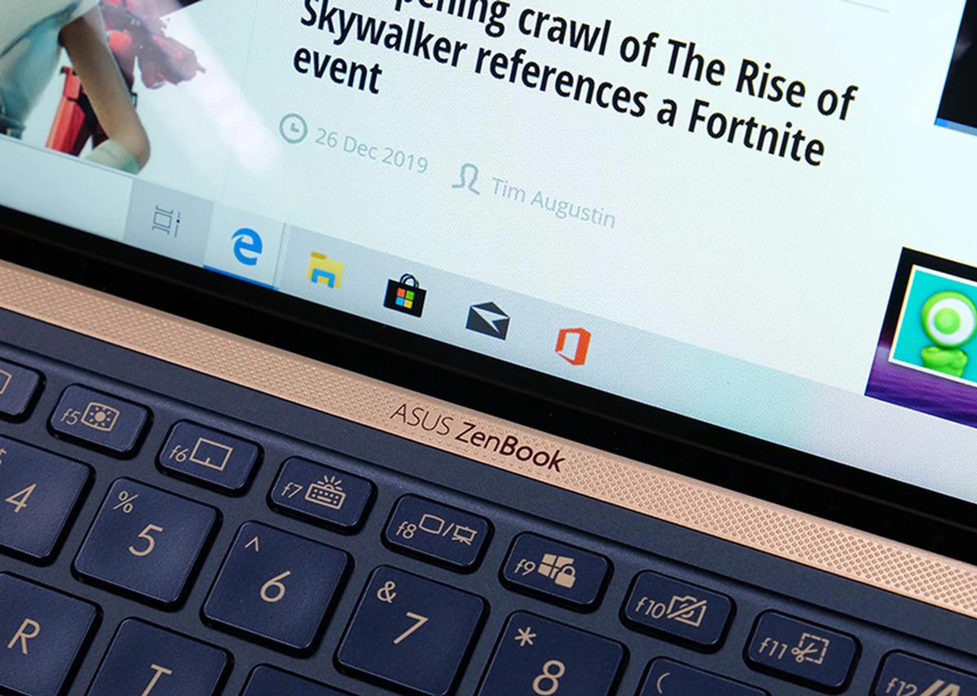 Gold accents on the chassis and keys elevate the looks of the ZenBook 14 UX434.