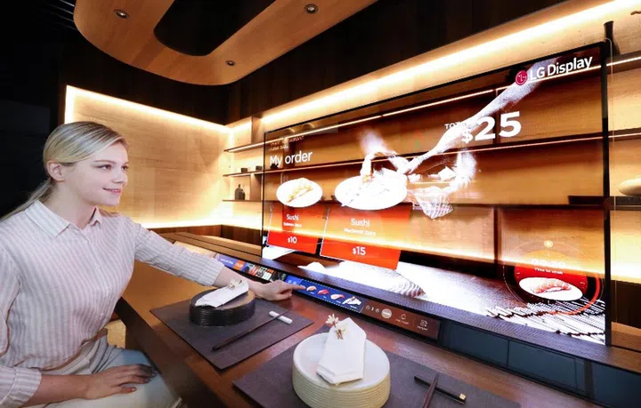 Watch the chef prepare your order as you also watch a movie. Image courtesy of LG. 