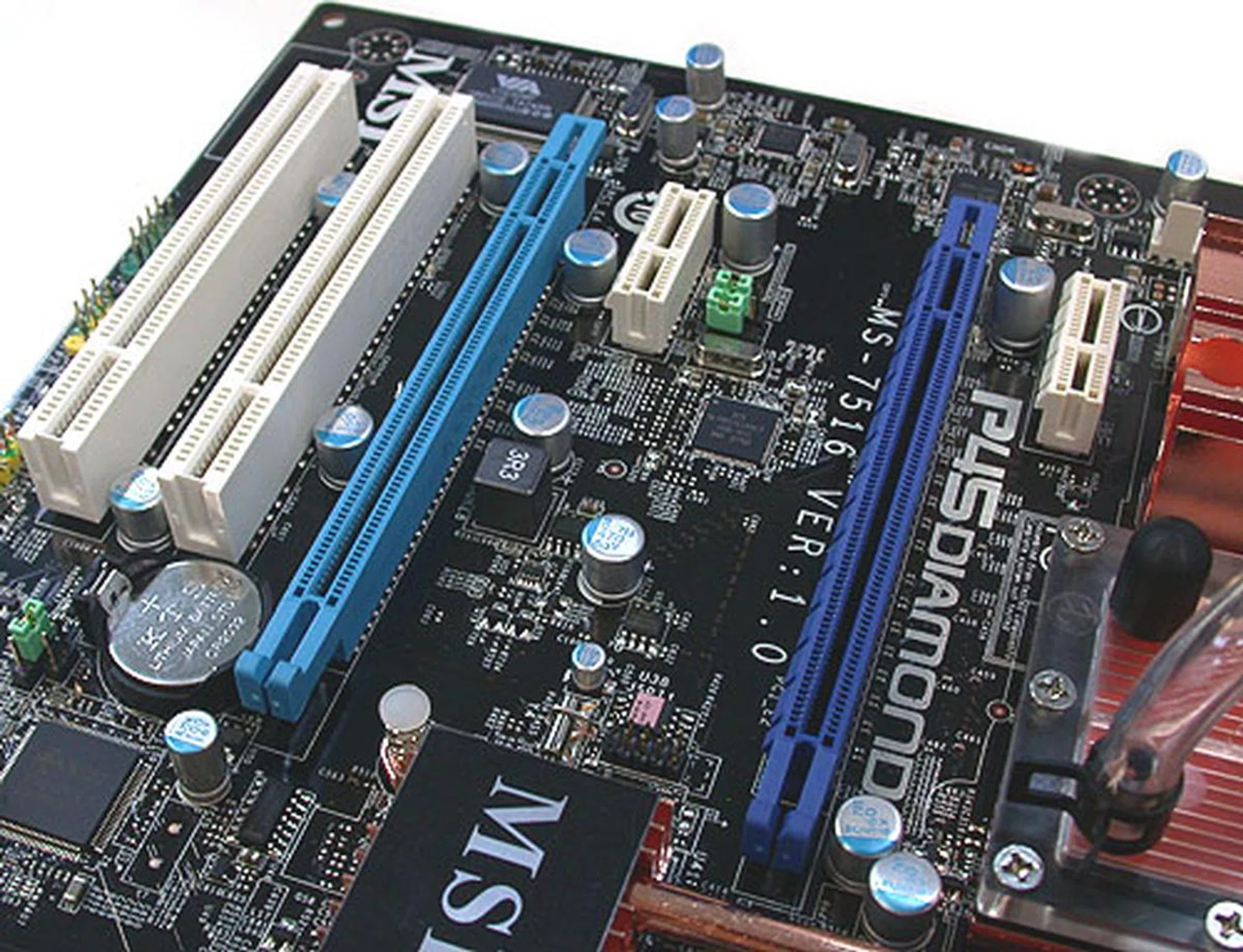 There are two PCIe 2.0 x 16 slots, 2 PCIe x 1 slot and two PCI slots. The PCIe x 1 slot on the right does seem a bit too close to the Circu-Pipe Liquid heatsink.
