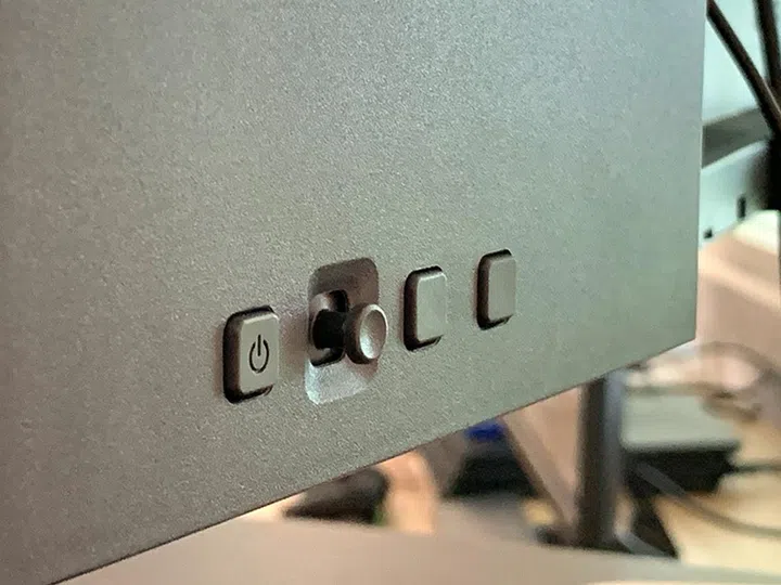 The power and OSD navigation buttons are found on the back of the monitor.