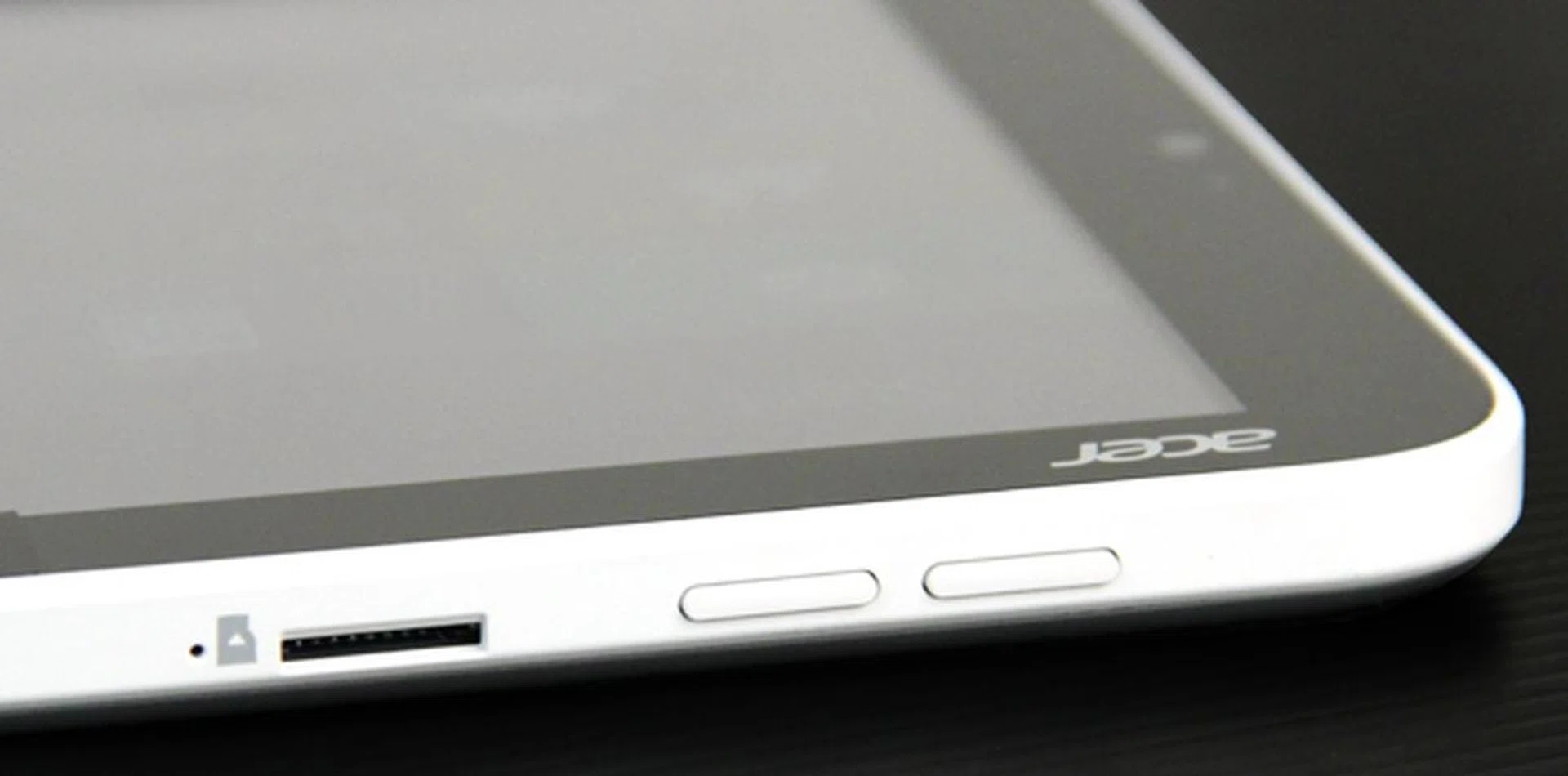 The microSD slot is located on the top edge next to the volume buttons.