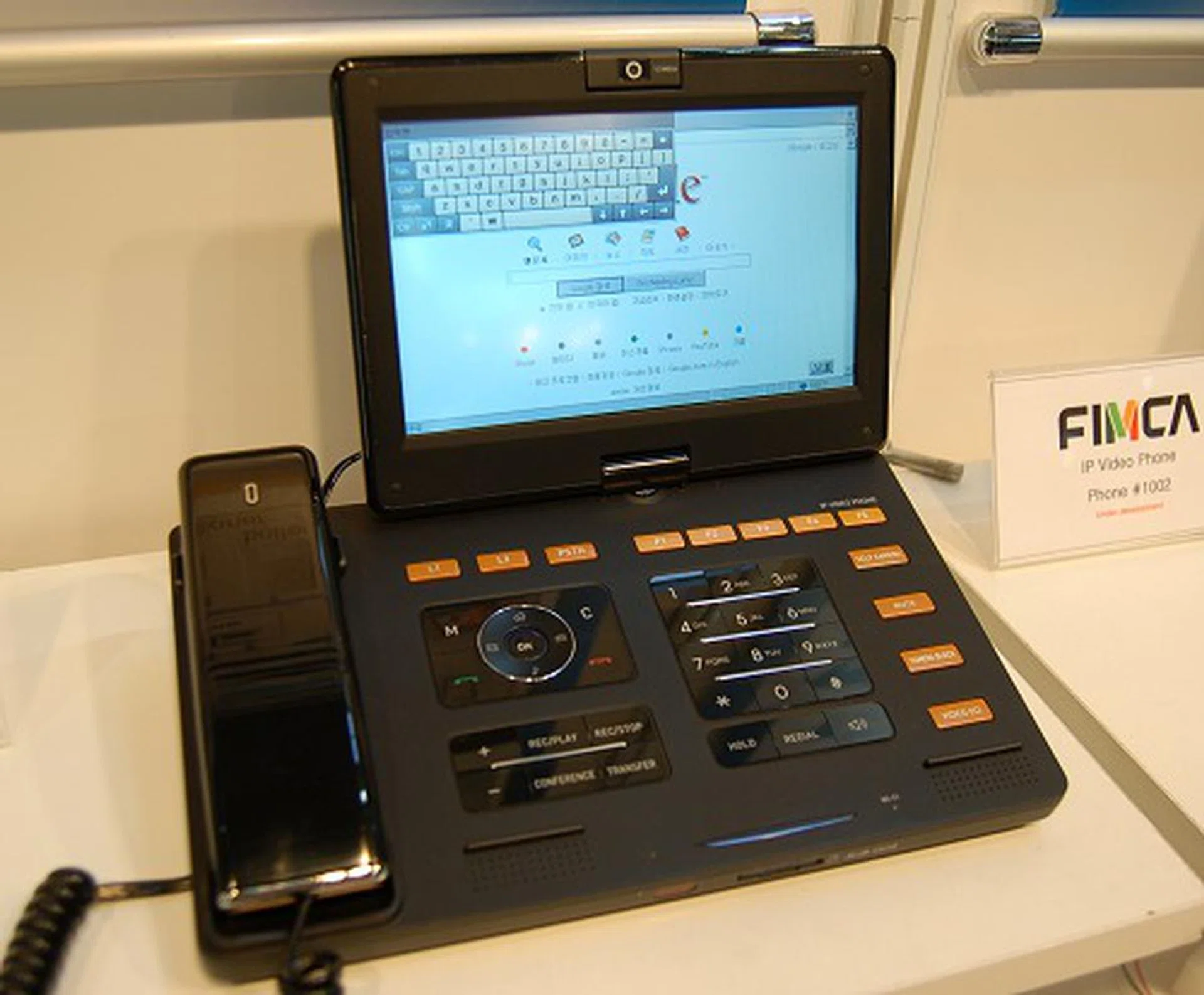  Korean company Hyunjin had this interesting VOIP video phone under the Fimca brand that acts as an entertainment and multimedia station as well. Equipped with USB , LAN, WAN, multi-card reader, AV in/out and even HDMI ports ï¿½ we bet you have a good idea of its networking and entertainment capabilities. It's huge 7-inch touch screen (800 x 480) handles internet video and audio pretty fluidly and did we mention it doubles up as a digital photo frame as well as able to surf the Internet?  