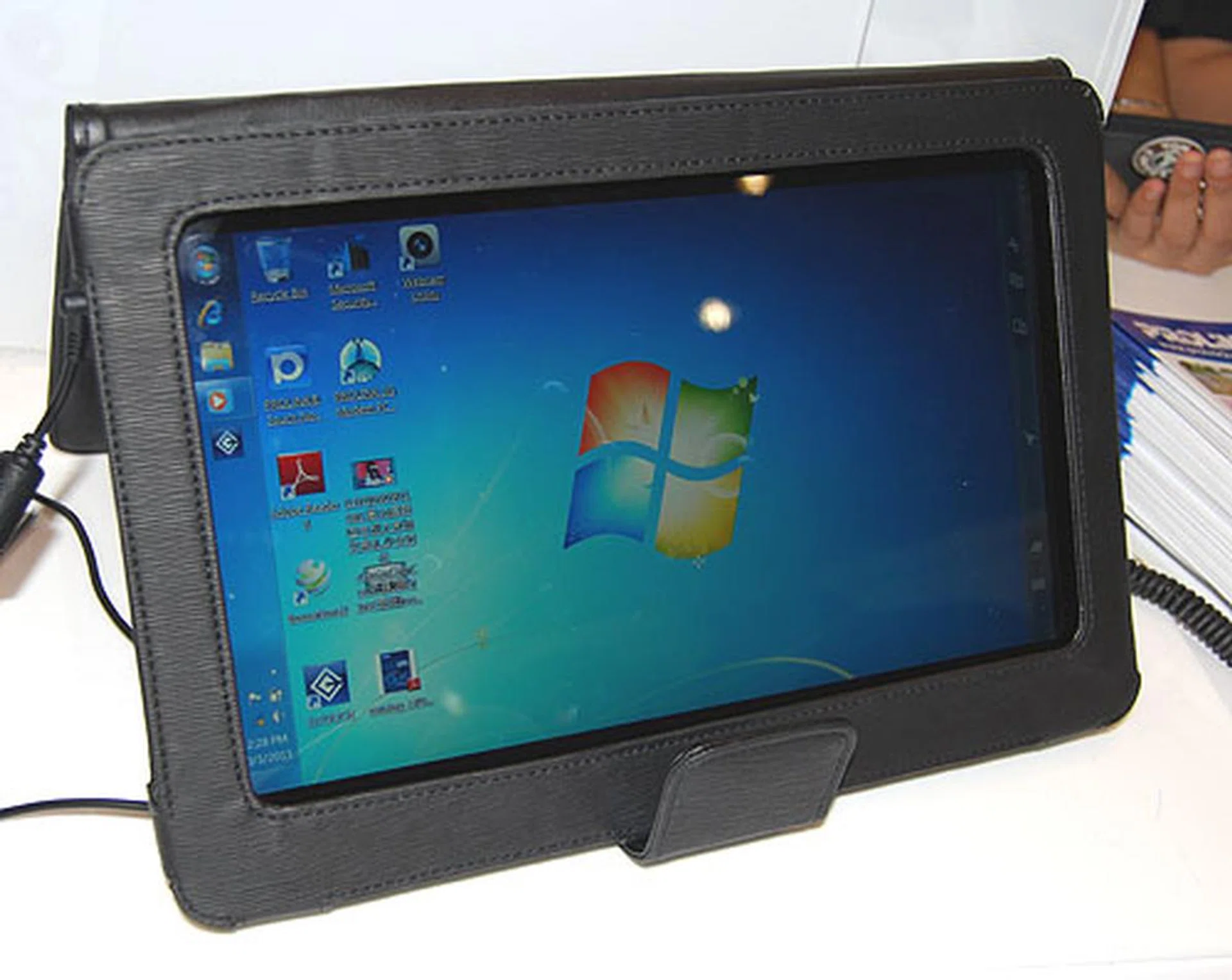 The Prolink Tablet PC TW8 is at its heart an Intel Atom system with a 11.6-inch screen. It comes with 1GB RAM, a 32GB SSD and has Win 7 Home Premium installed. It's going for $999, and you can add 2GB more RAM for $55. The 1st 50 customers also get MS Office 2010 (OEM) free. 