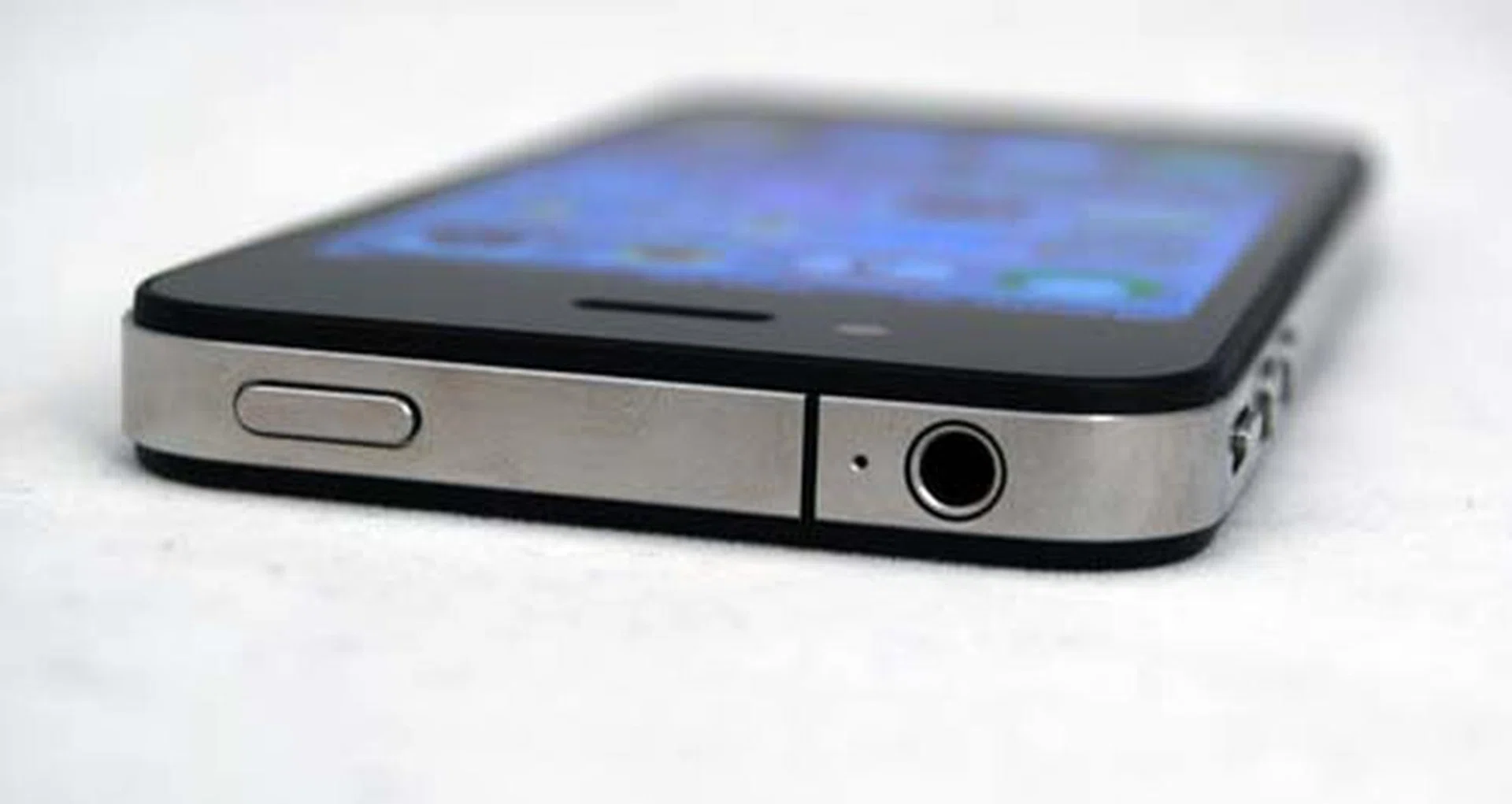 The Apple iPhone 4 does retain some design similarities as previous models. For instance, the only change at the top is the removal of the SIM card slot and the addition of a second microphone for the noise cancelling feature.