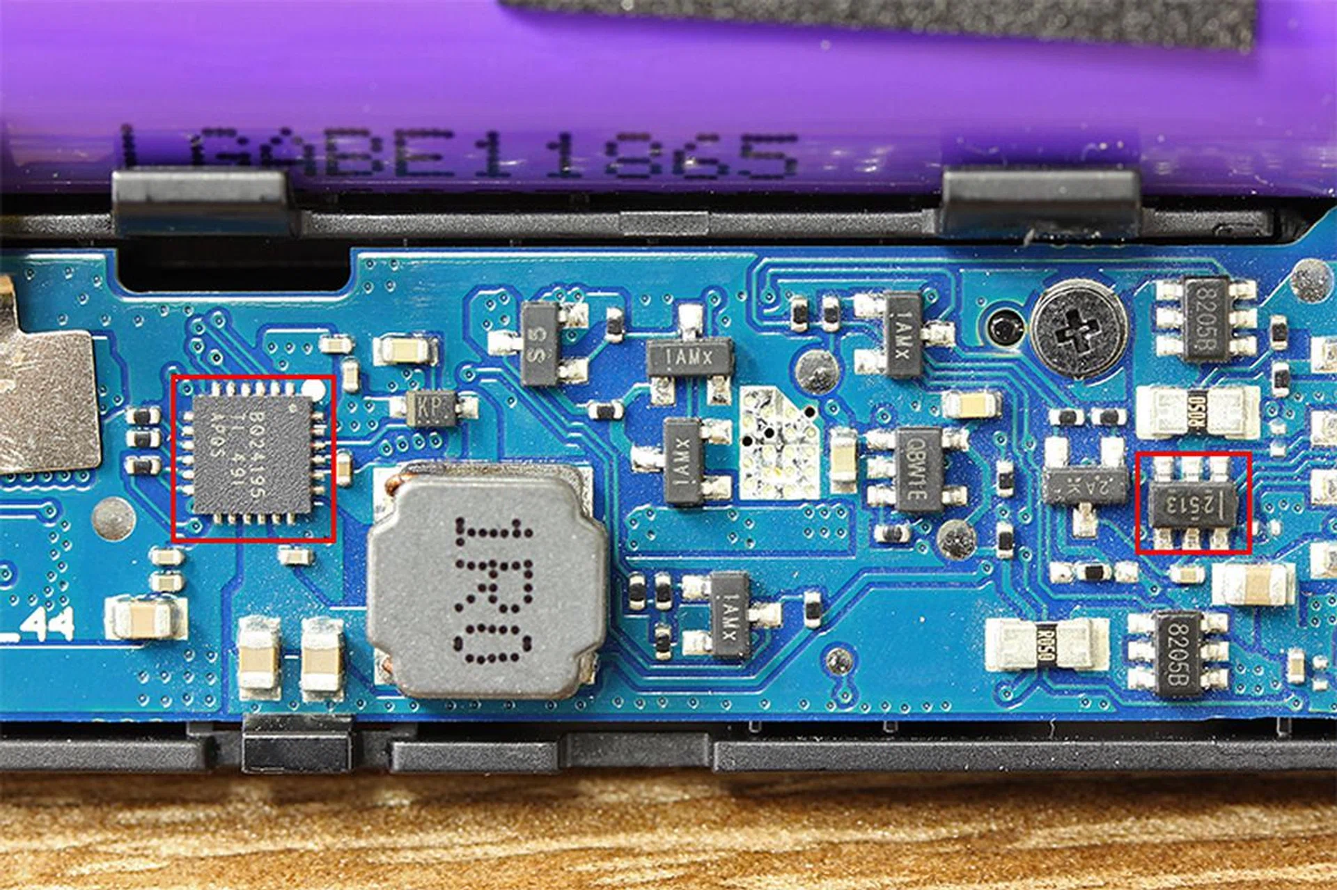 Two Texas Instruments chips here: the BQ24195 charging and power IC and the TPS2513 DCP controller. Also notice the resistors (R050) and protective ICs (8205B) that are used to protect the cells.