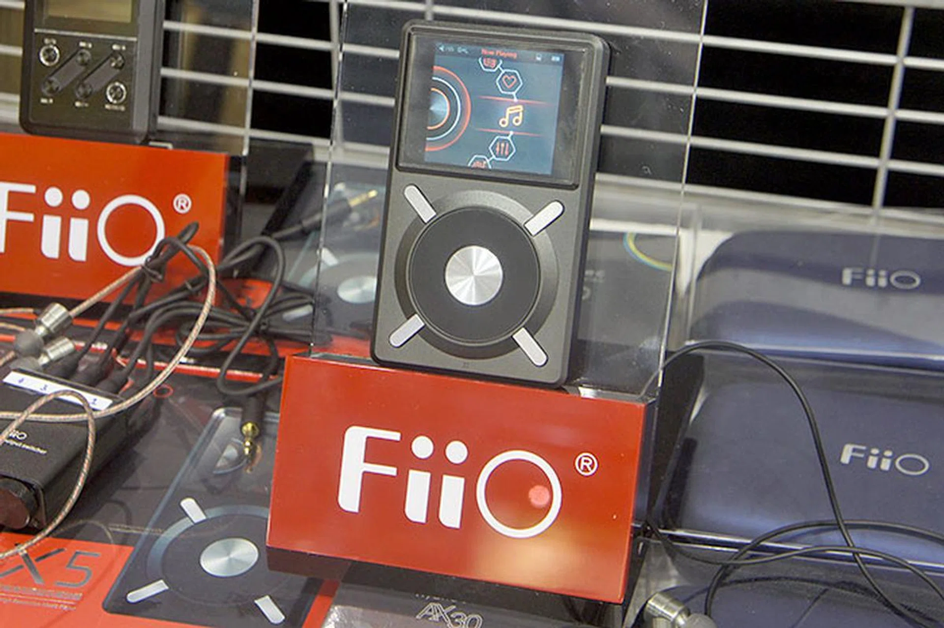 The FiiO X5 is a high-end portable music player that has a dual-core 600MHz CPU. It's not just a DAP, but a USB DAC (supports 192KHz/24-bit) as well when connected to a PC. Under the hood, it uses TI's top-end PCM1792A (for the DAC), four OPA1612 (for current/voltage conversion and amplification), and two LMH6643 (for headphone output). The price? $479 at The Headphones Gallery's booth.