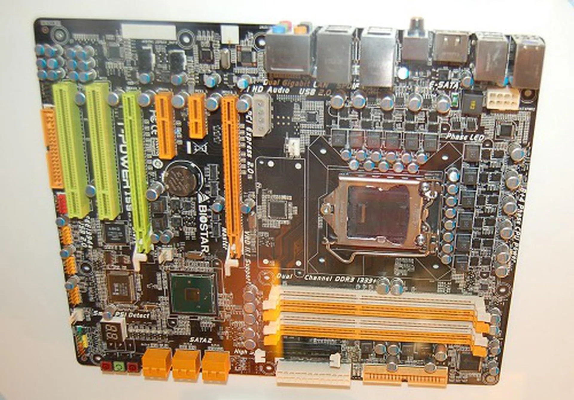  And here's their upcoming Intel P55 motherboard for Core i5 processors (LGA-1156). This new upcoming processor will incorporate even more of the traditional Northbridge functionality like PEG support. It will however only support a single PCIe x16 interface; thus the dual PEG slots seen on the board are most certainly for PCIe X8 / X8 operation. Only CrossFire support is available on these boards.  