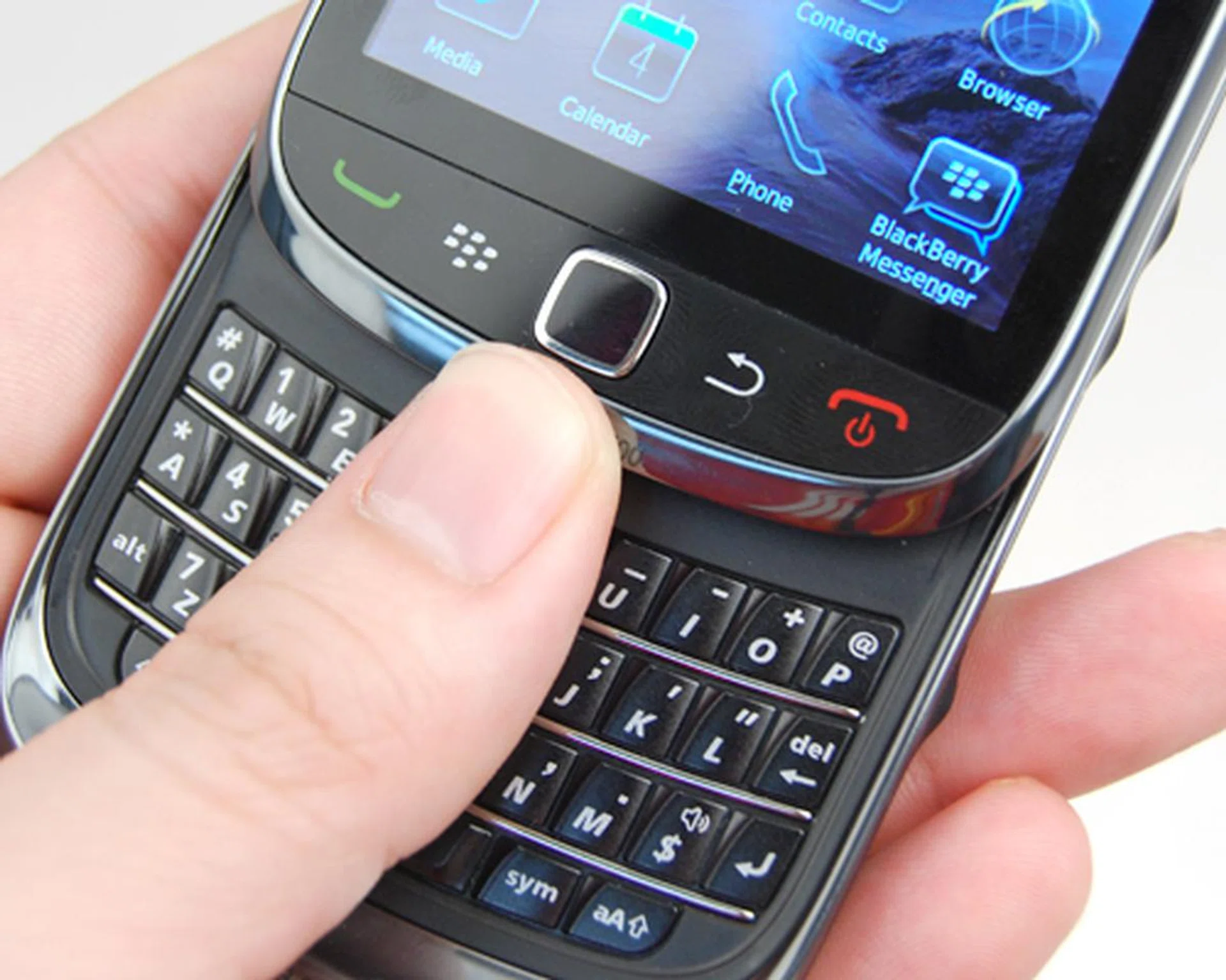 Due to the slider design, the keys on the top row can be slightly restricted by the display.