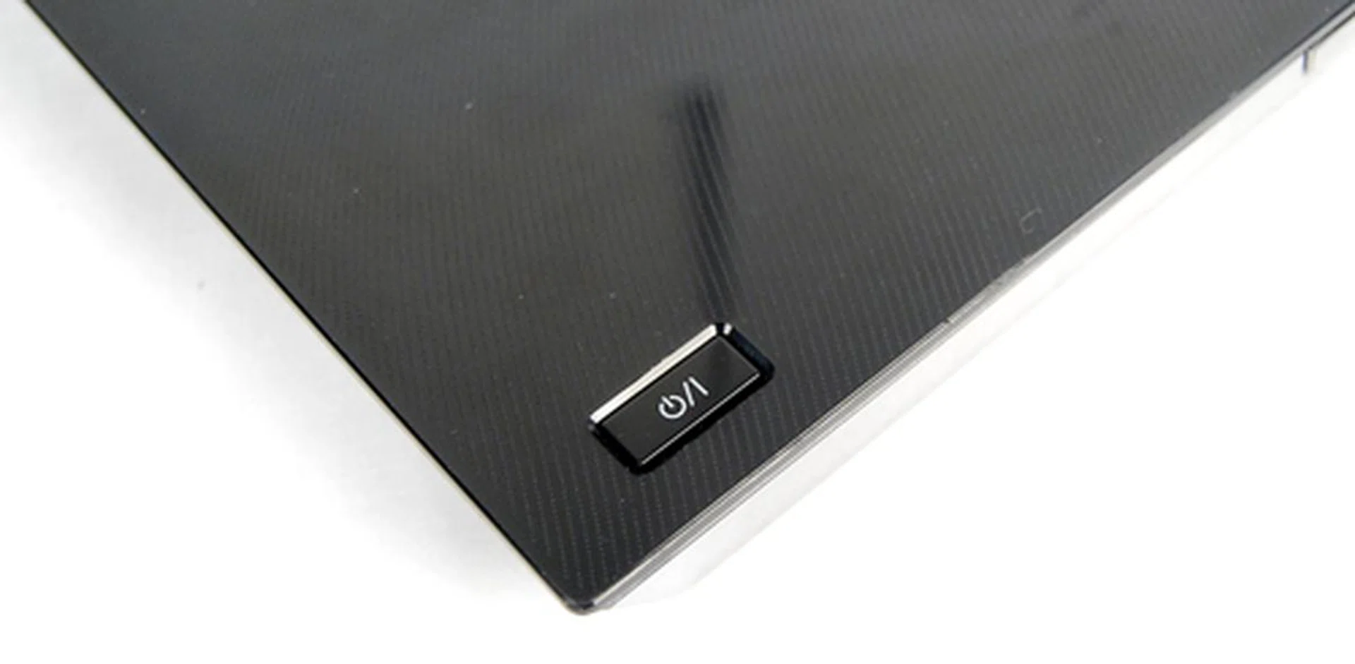 Mechanical feedback is provided for the power button to provide tactile feedback to users.