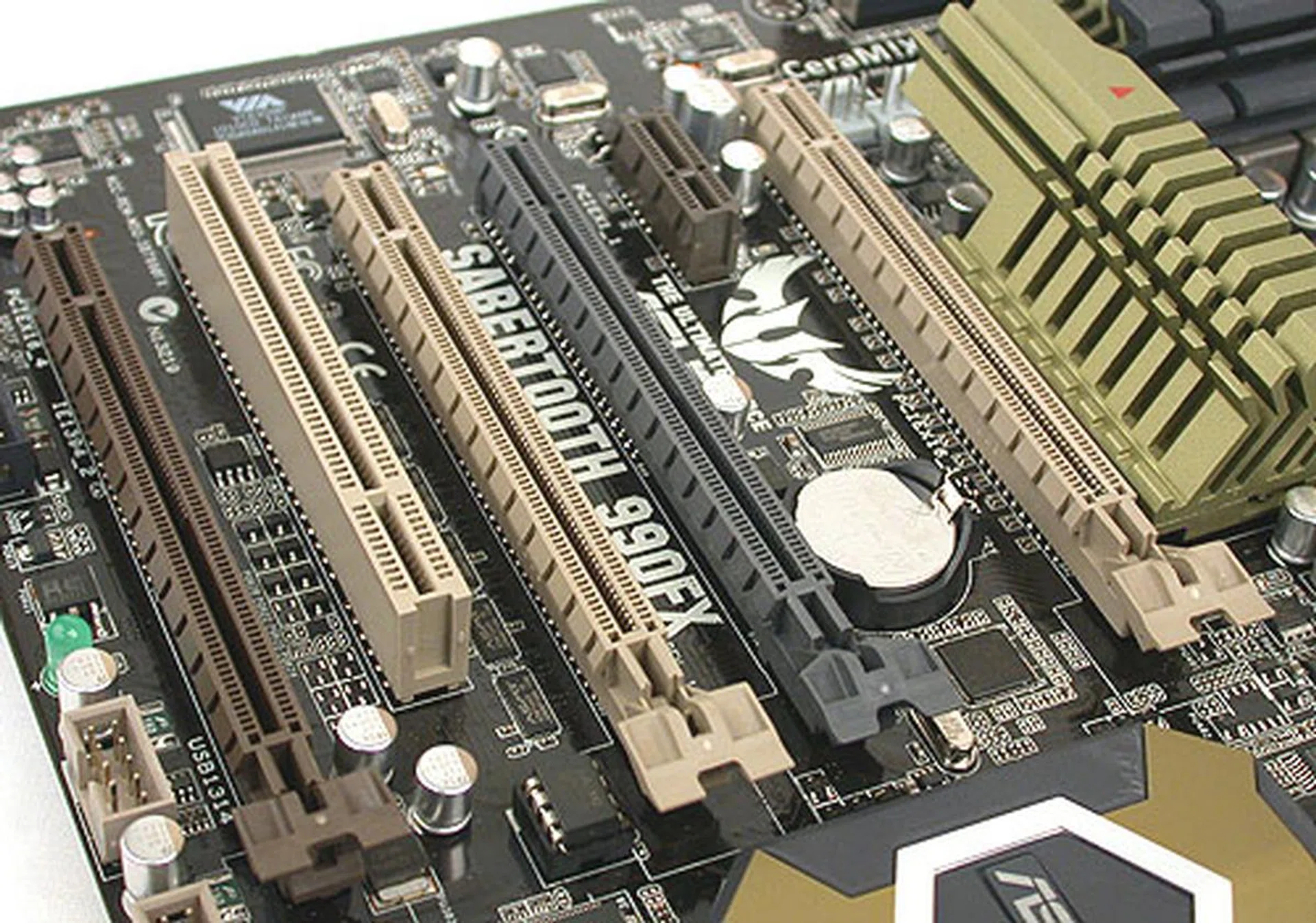 There are four PCIe 2.0 x16 slots here, but we recommend only filling three of them in a x16/x8/x8 auto-configuration. The fourth slot (in black and sandwiched in between) has a limited PCIe bandwidth of x4, making it less than suitable for multi-GPU setups.
