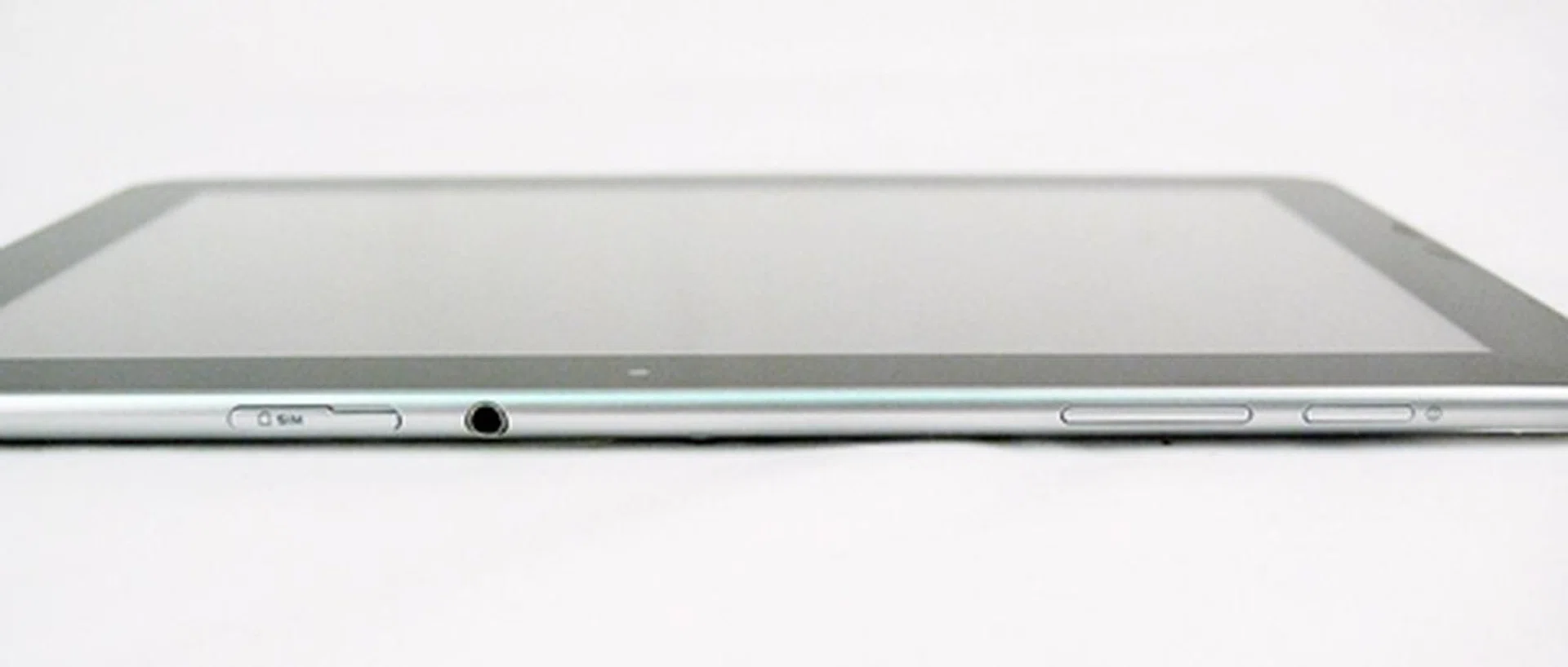You can find the SIM card slot, 3.5mm audio jack, volume controls and Power button on the top section of the device.