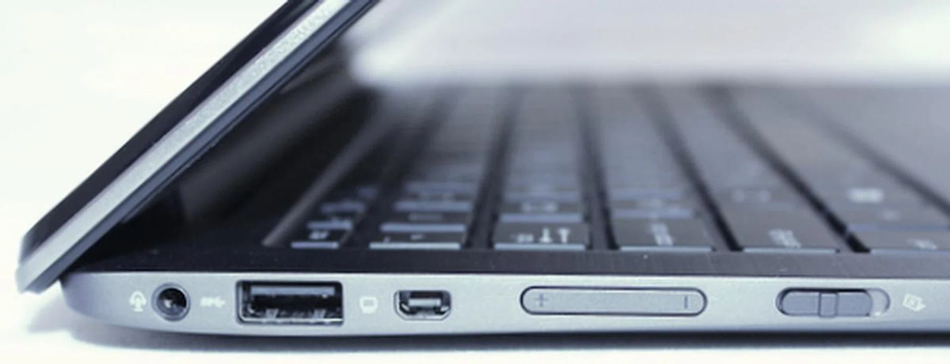 From left to right, the Taichi has an audio output jack, USB 3.0, mini-DisplayPort, volume control and a Screen Switch slider on the left side of the machine.