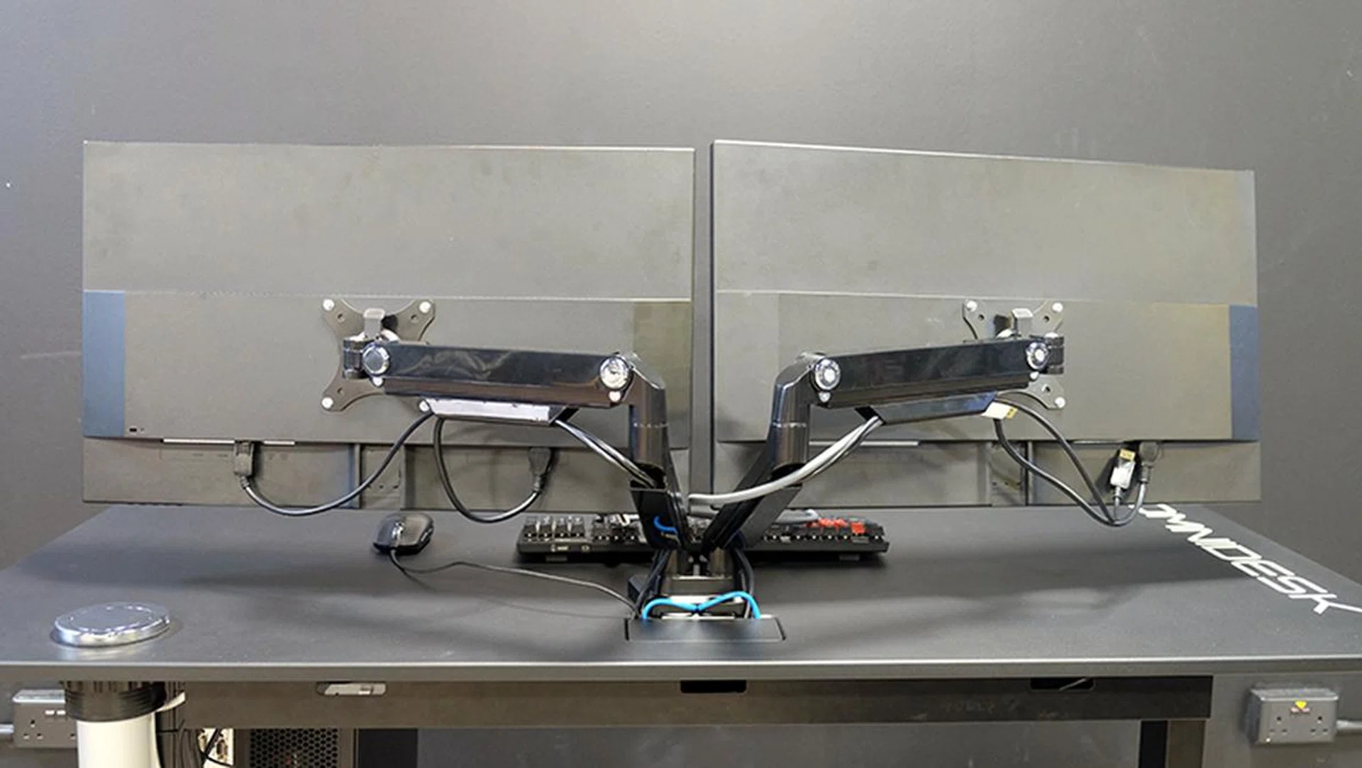 A look at the monitor arms from the back.