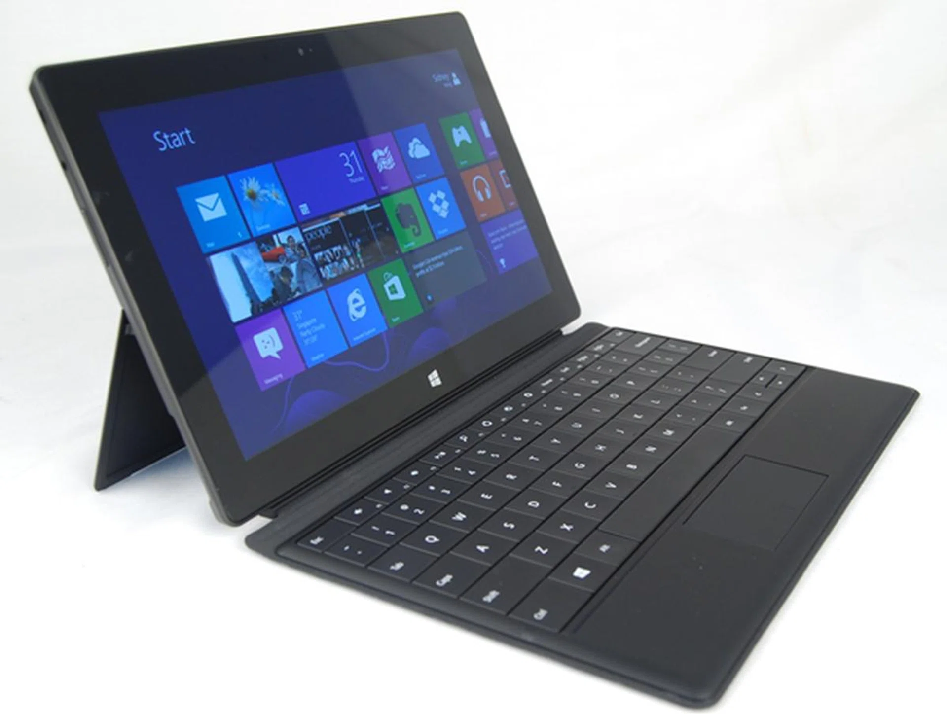 With the Type Cover attached, the Surface looks and even somewhat functions like a full fledged Ultrabook. The total weight of the Microsoft Surface with Windows RT with the Type Cover accessory attached is about 930 grams.