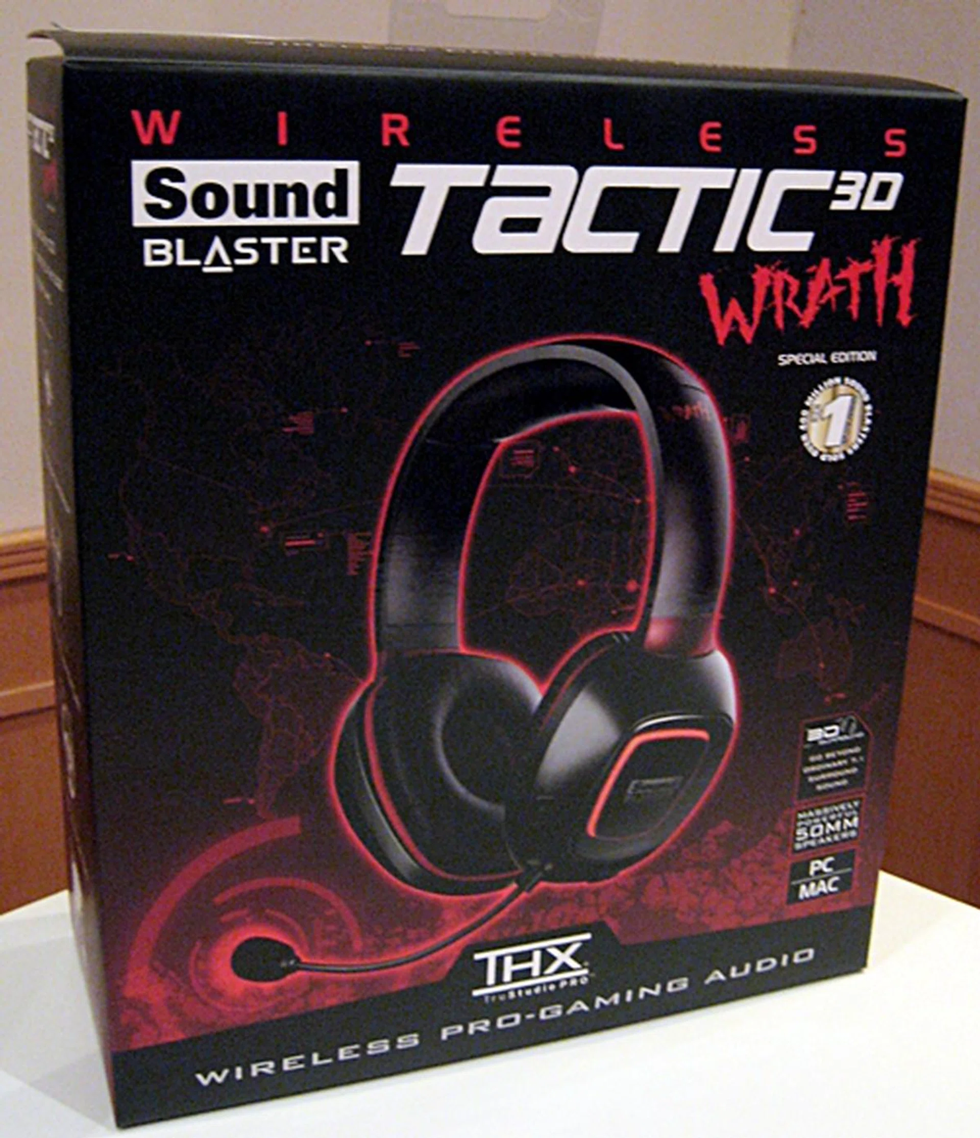 The retail box for the Tactic3D Wrath wireless gaming headset is a sharp departure from the hard plastic clam shell packaging of the Tactic3D Sigma. The Tactic3D Sigma also comes with a USB dongle for wireless transmissions when the headset is connected to a PC or Mac. 