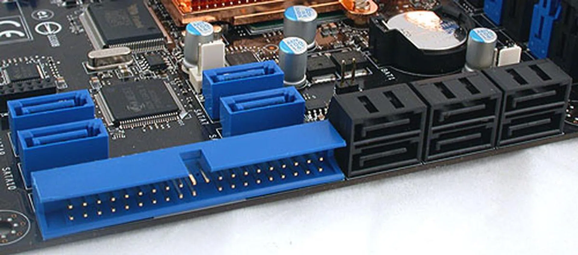Extra controllers from JMicron help to explain the many SATA ports on the Eclipse. IDE functionality is still supported at least, unlike Intel's reference board. 