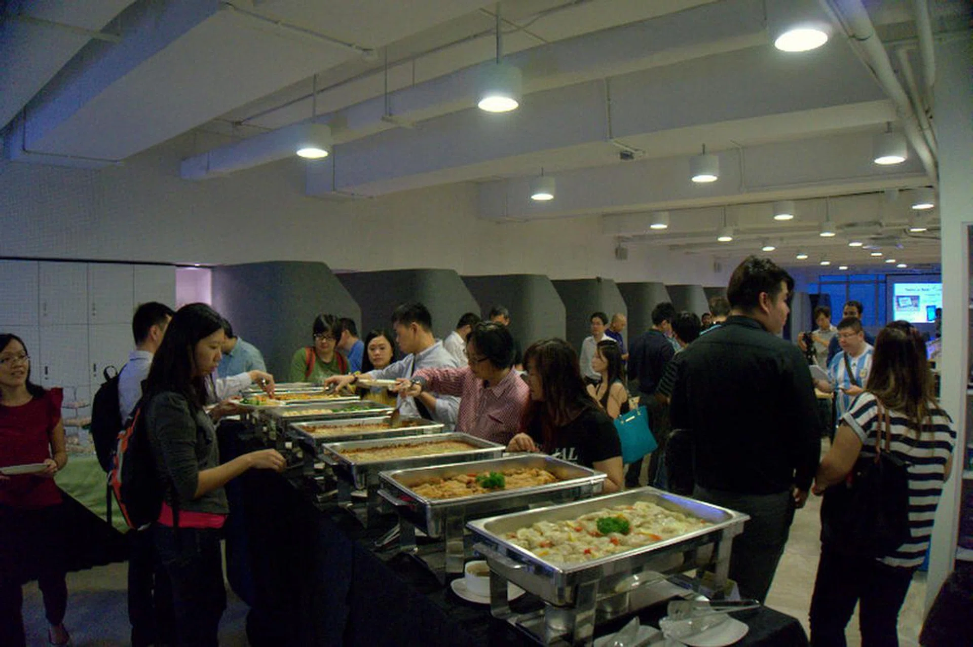 While some of the attendees checked out the tablet spread, others were busy at the buffet spread, specially prepared for the evening event.