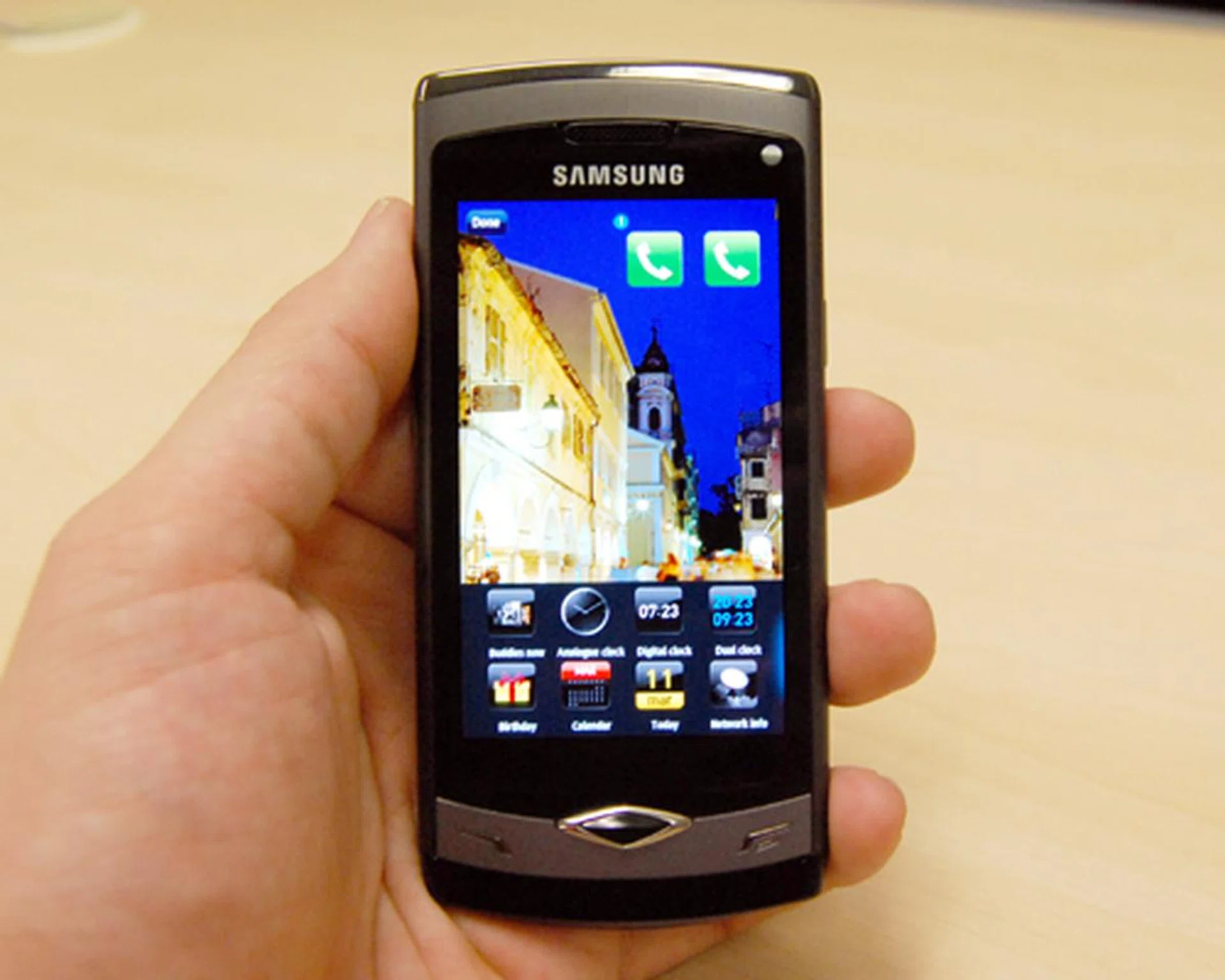 Samsung's new TouchWiz 3.0 interface reshuffles its widget bar at the bottom, and adds more widgets for easy access to your social networking sites.