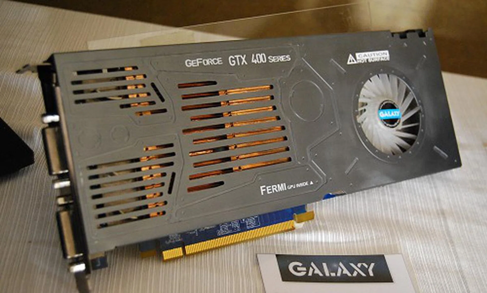 And here's an unbelievably thin single-slot GeForce GTX 470 card from Galaxy. It looks and sounds impossible, but it's almost finished product, which means we'll have dibs on this in due time. We'll find out how it fares then.