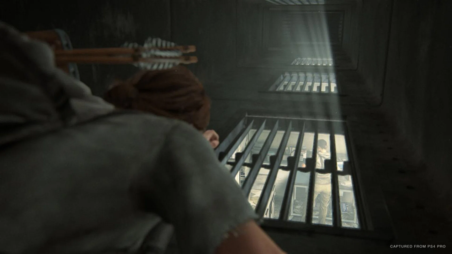 Ellie is much more nimble than Joel was in the first game, so it makes sense that exploration works differently for her. She can go prone and squeeze underneath cars and into vents, or shimmy through narrow cracks in walls. | Image: Sony Interactive Entertainment