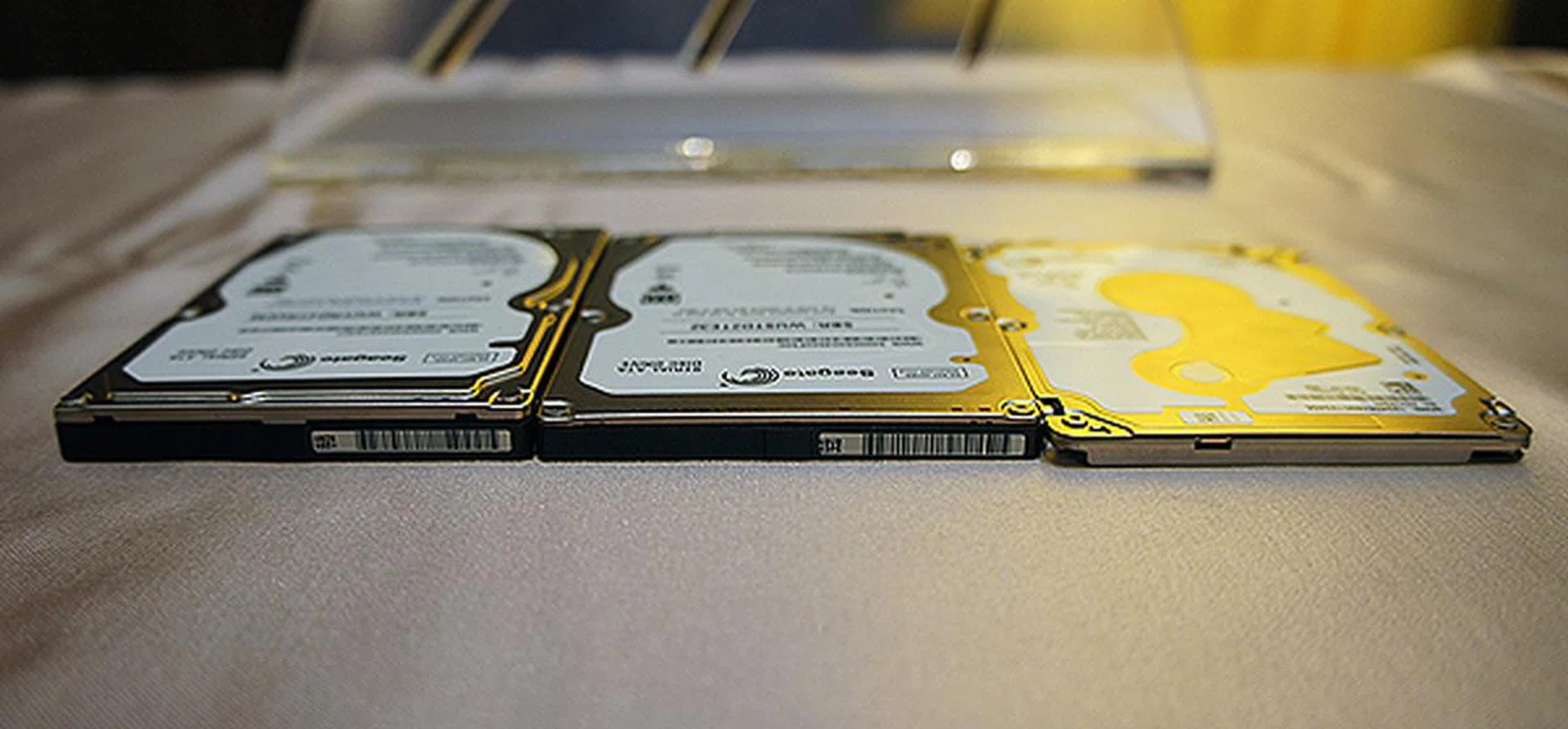Seagate's hard disk evolution: 9.5mm thick drive on the left, 7mm thick drive in the middle and the new 5mm thick Laptop Ultrathin HDD on the right.