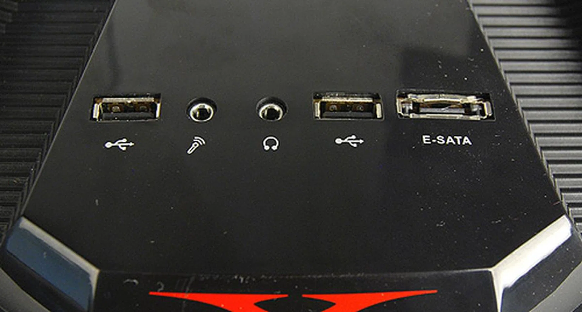 The front I/O panel is adorned with two USB 2.0 ports, an eSATA port, and headphones and microphone jacks,