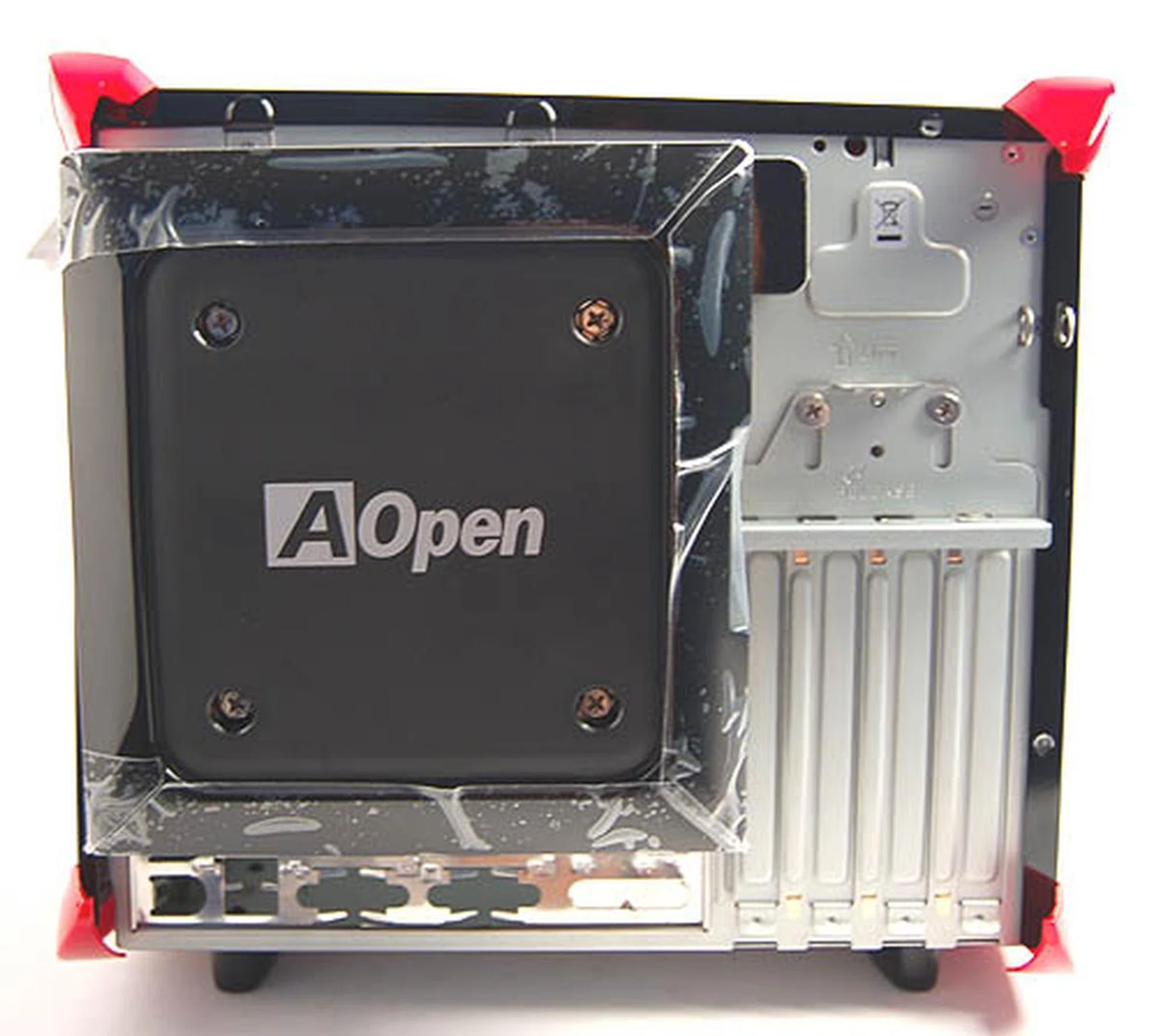The black compartment protuding out at the back is the external housing for the PSU. 