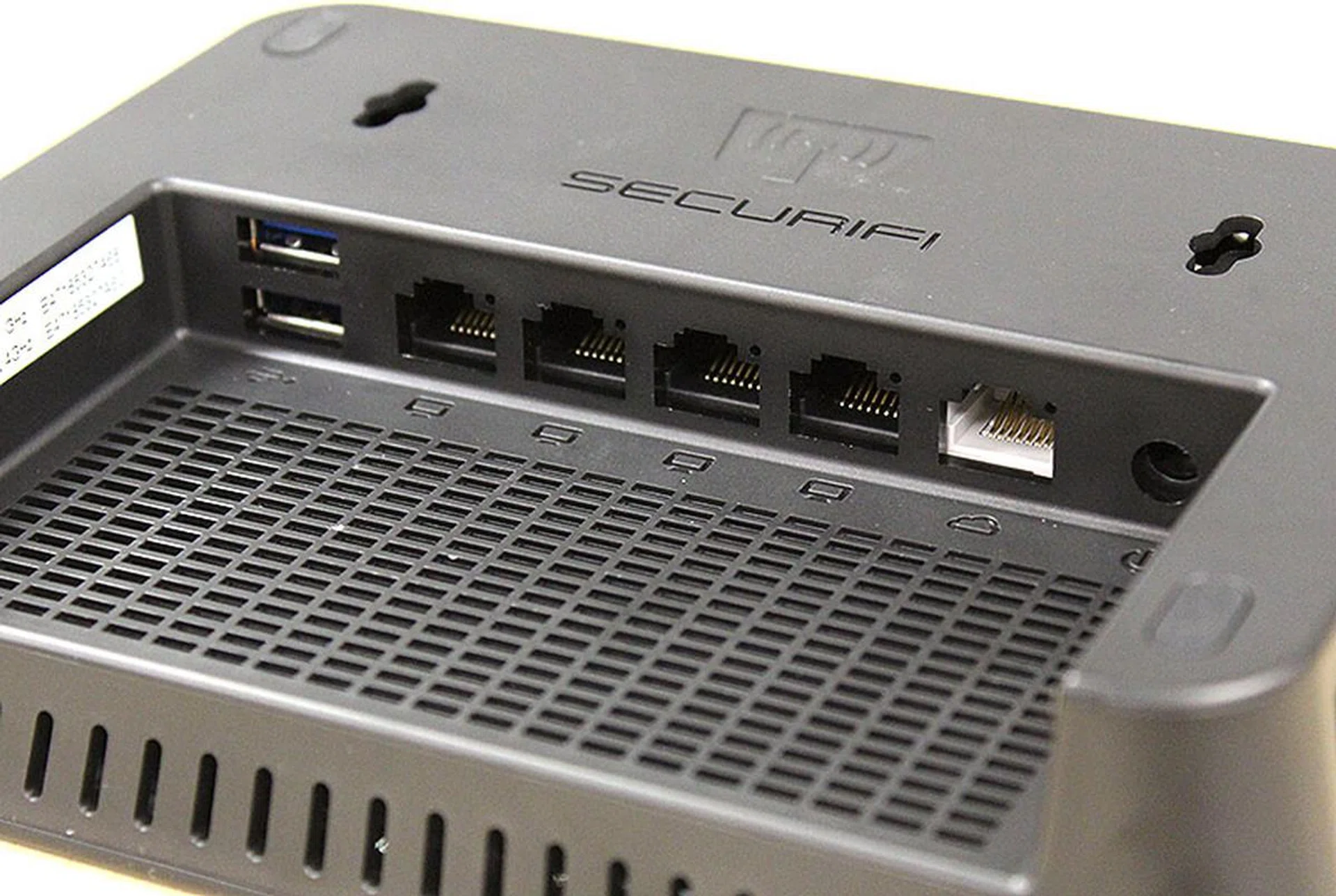 The ports are located behind the router in a recess, which makes it quite hard to reach.