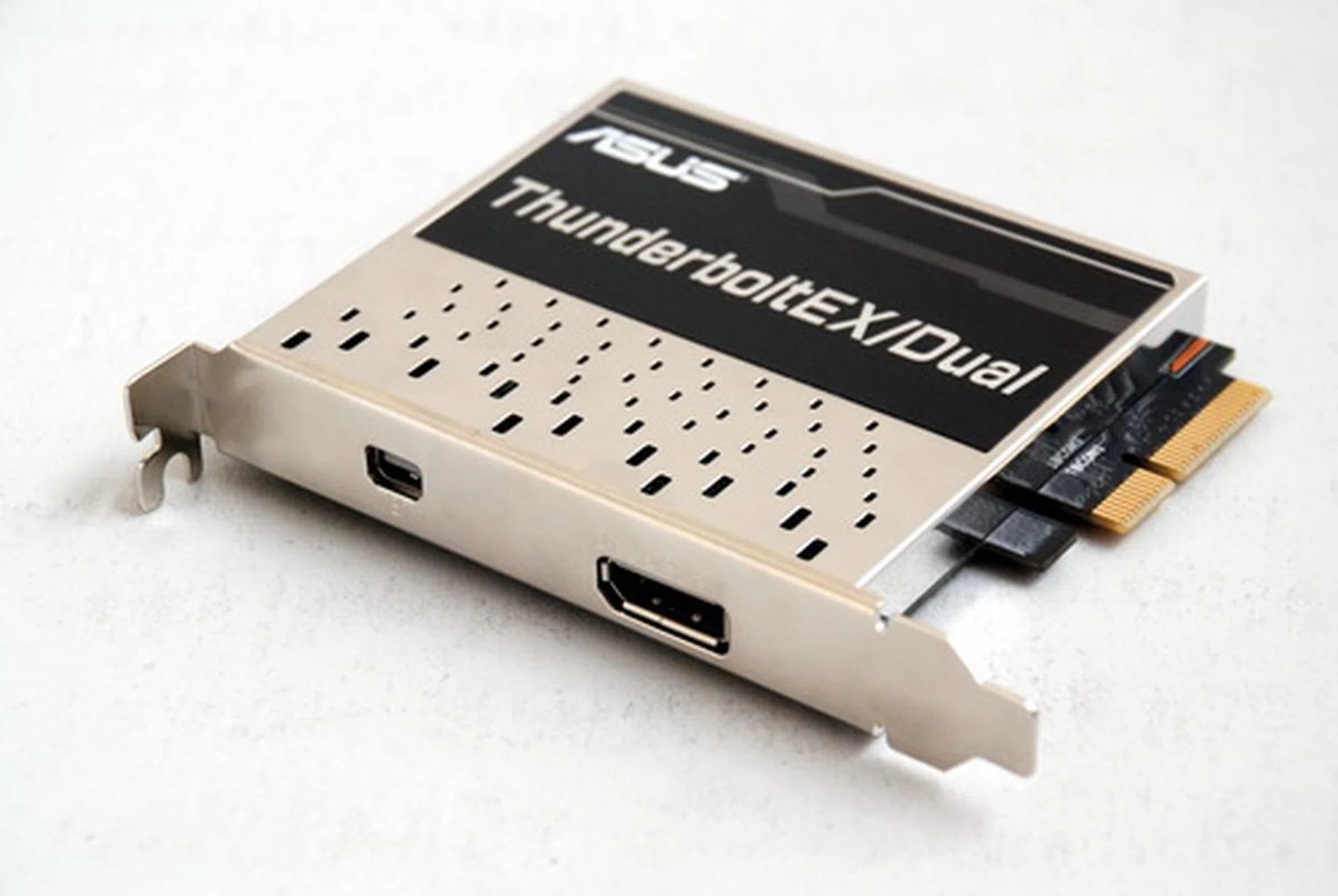 Using a PCIe x4 interface, the ThunderboltEX is made to occupy one of the lower corresponding expansion slots on their motherboard. It’s also compatible with a PEG slot, but it will occupy just a small portion of a PCIe x16 slot. The compact card comes with two external connectors - a Thunderbolt port and a DisplayPort.