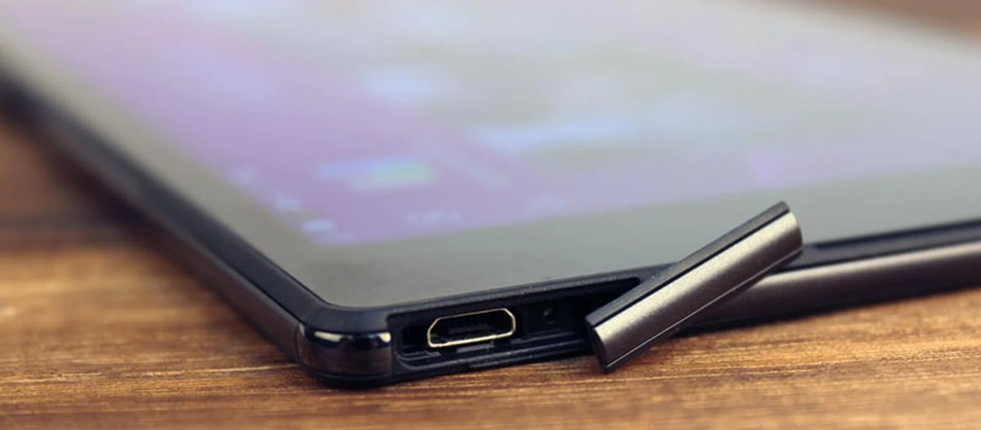 The micro-USB port is hidden under a waterproof flap that needs to be carefully pushed back in to reseal it after each use.
