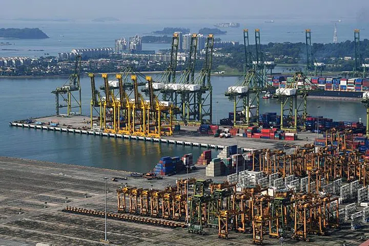 One of the key uses of 5G here is in smart port management, where the operator can remotely control driverless cranes and trucks to load and unload containers, or remotely inspect machines using driverless drones. Photo: ST File