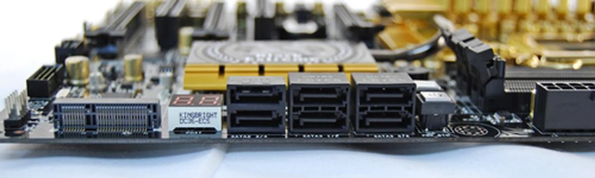 The SATA connectors are all black, making it difficult to identify which ones are SATA 6Gbps compliant unless you scrutinize the fine print on the board or read the manual. The SATA 3Gbps connectors are on the left, while the four SATA 6Gbps ones are those in the middle and right stacks. 
