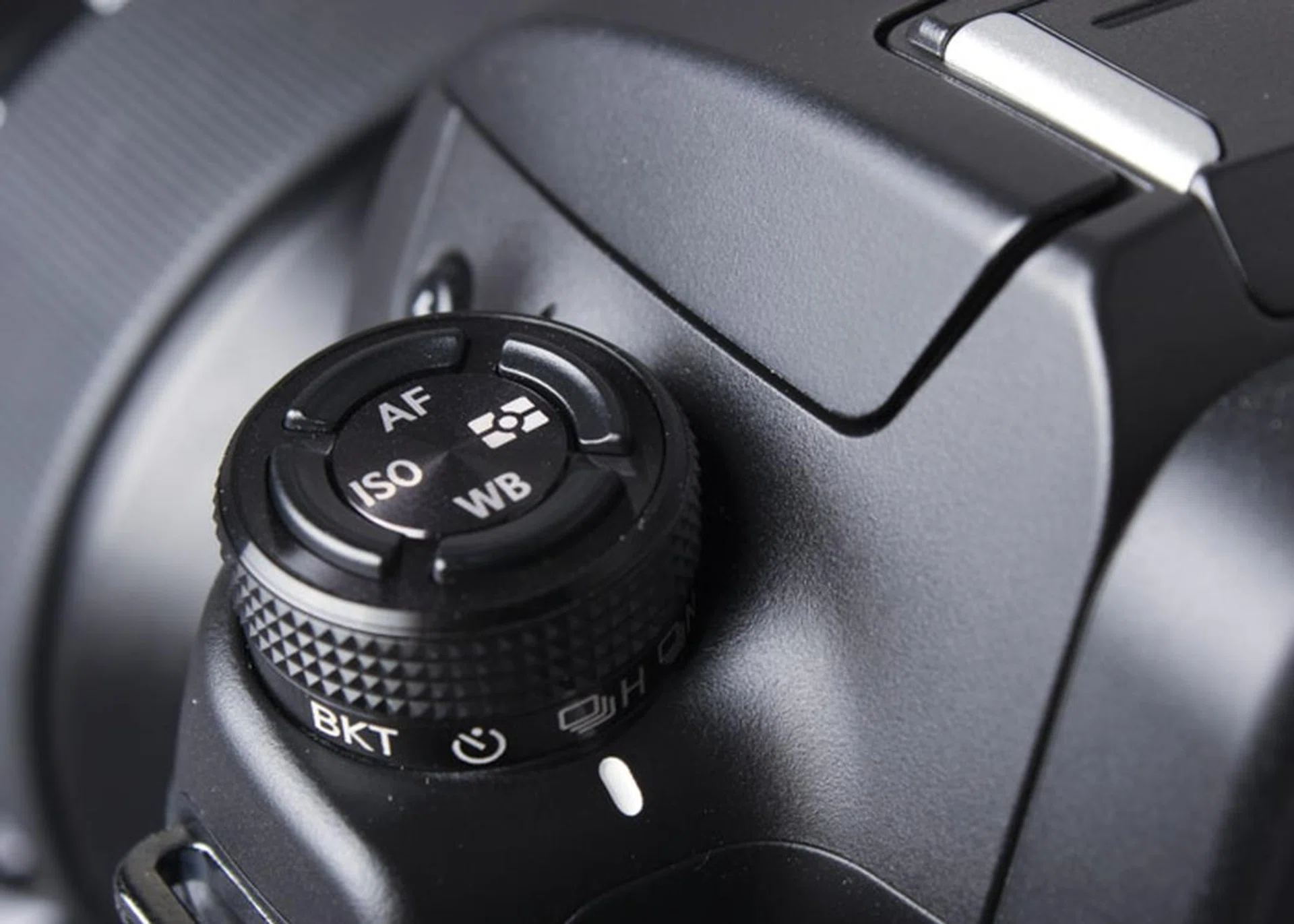 The top buttons seem like thin slivers but they're raised enough to reach easily.
