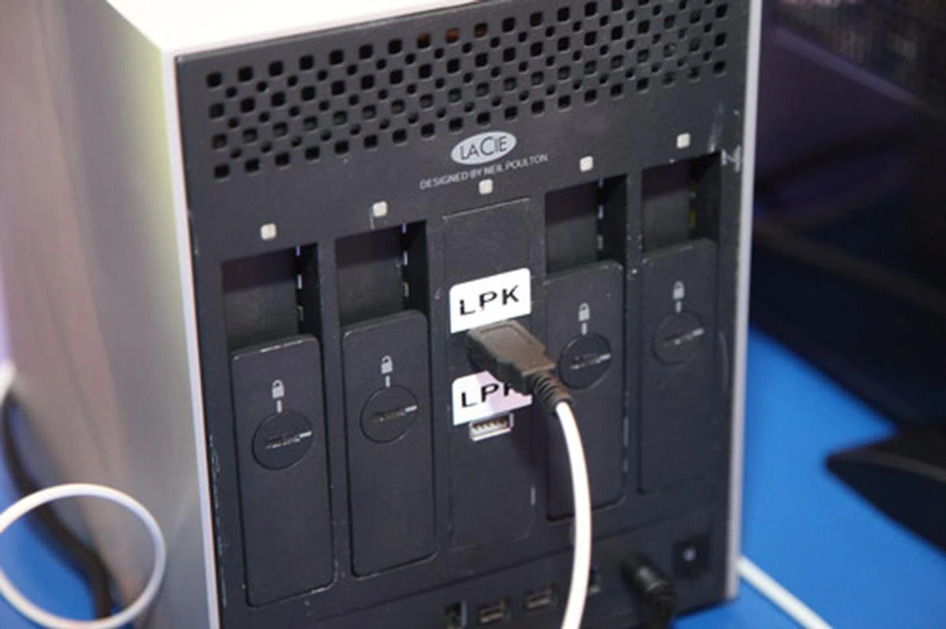 A LaCie RAID storage box modified with a Light Peak connector. In it, they installed four SSDs, all configured in RAID 0.