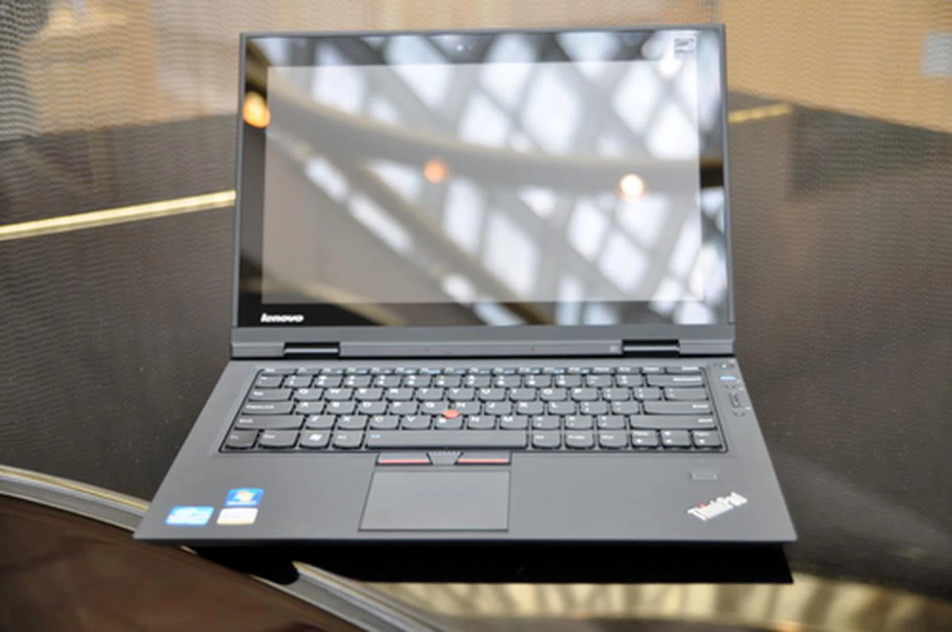 The glossy screen may be a break from the traditional matte screens, but it may not turn out to be a bad thing, given that it's Gorilla Glass.