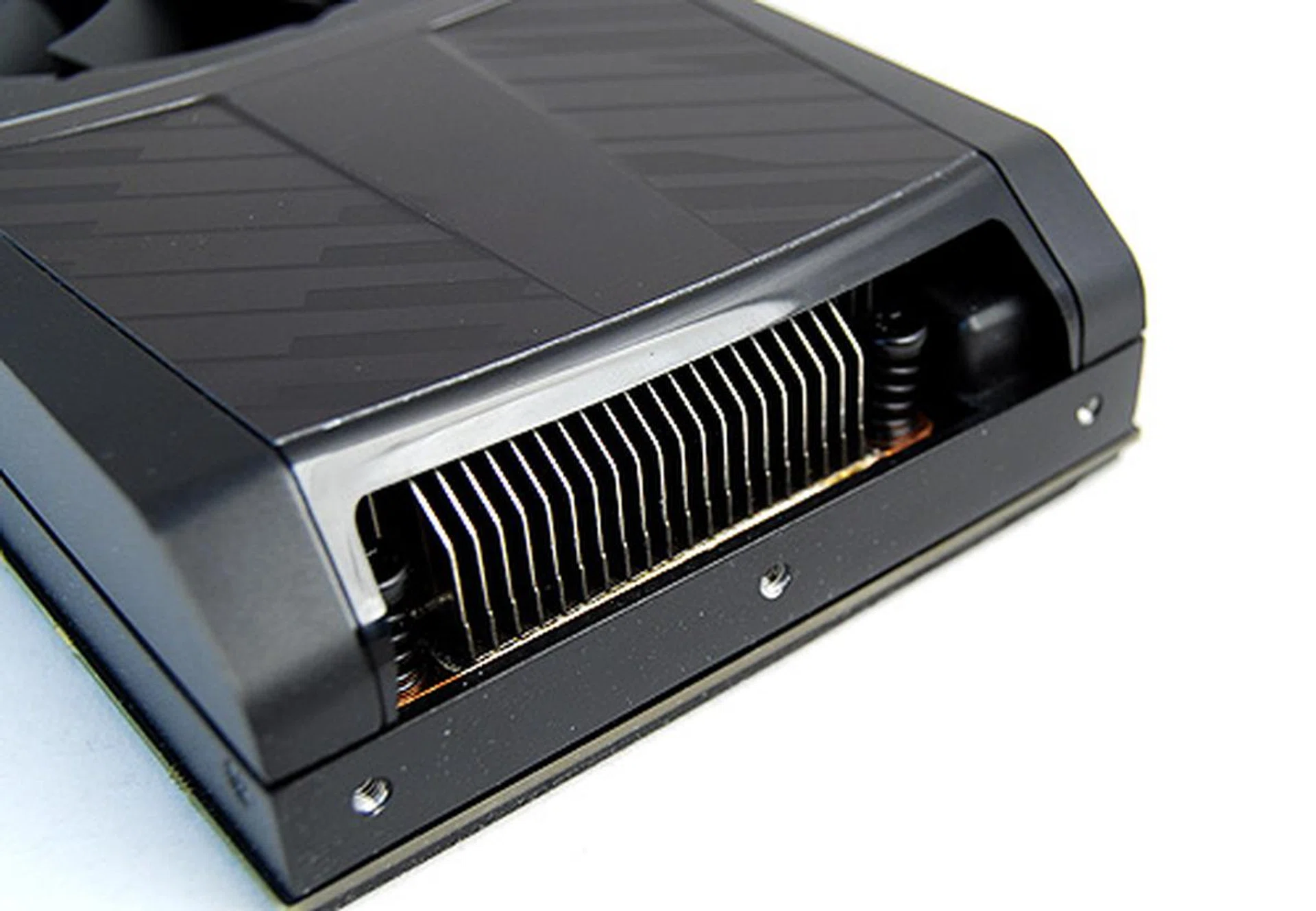 A casing with adequate ventilation is necessarily because hot air is vented out of the card through these rear exhaust and back into the casing.