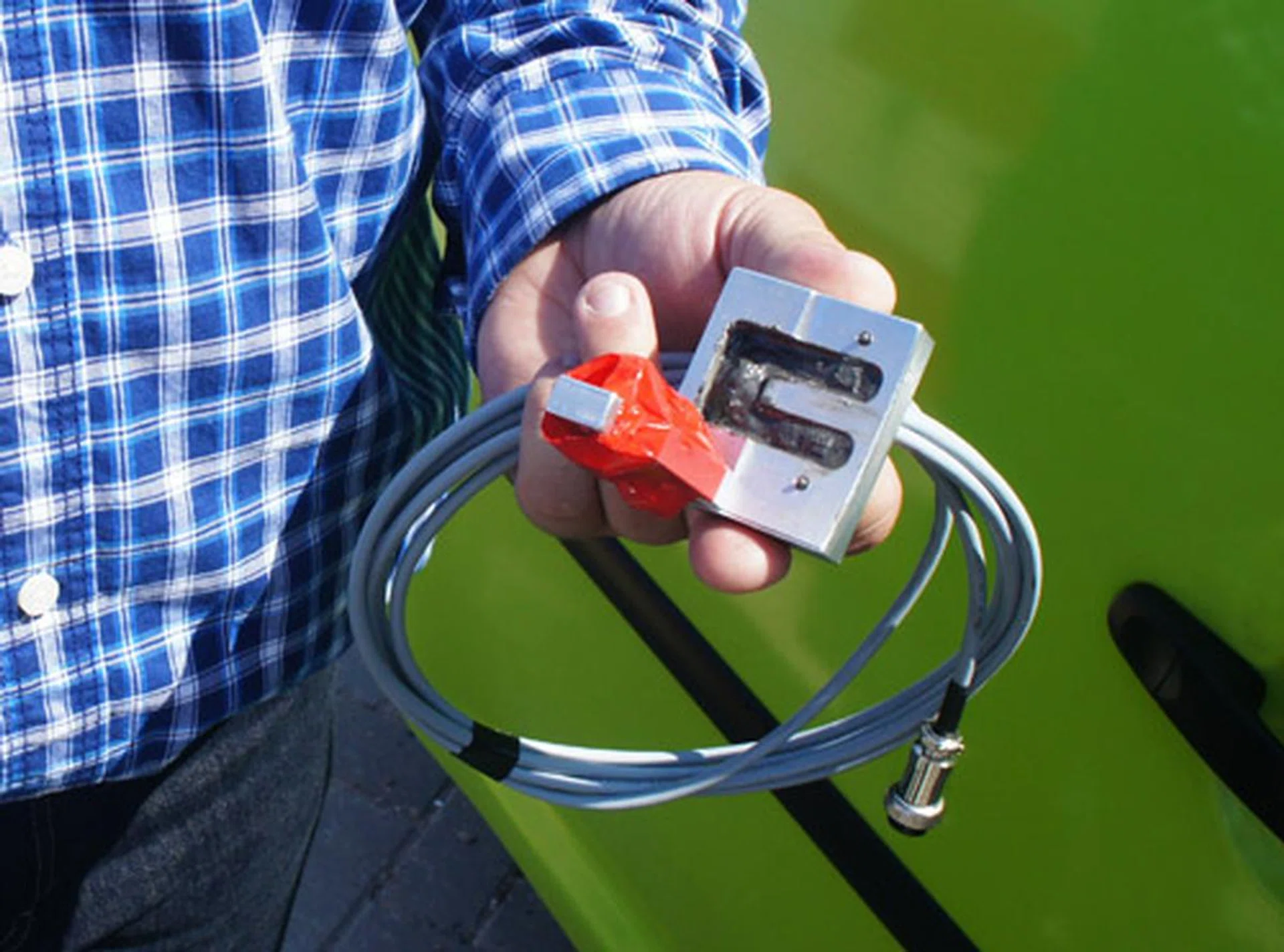 Sensors are mounted onto each wheel to accurately determine the distance the van has traveled.