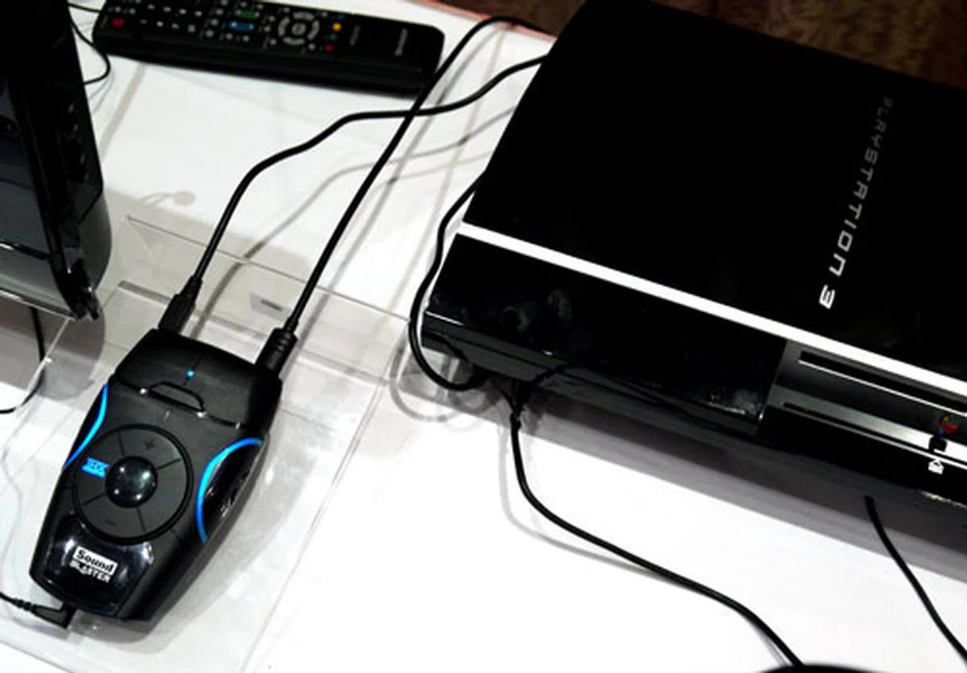 The Recon3D's USB port is used to power the device when connected to a console. Its audio source is delivered via the PlayStation 3's optical outlet as shown here. The 3.5mm outlet can be used to power 2-channel speakers as well. Priced at S$169, the Recon3D is currently available at all Creative outlets.  