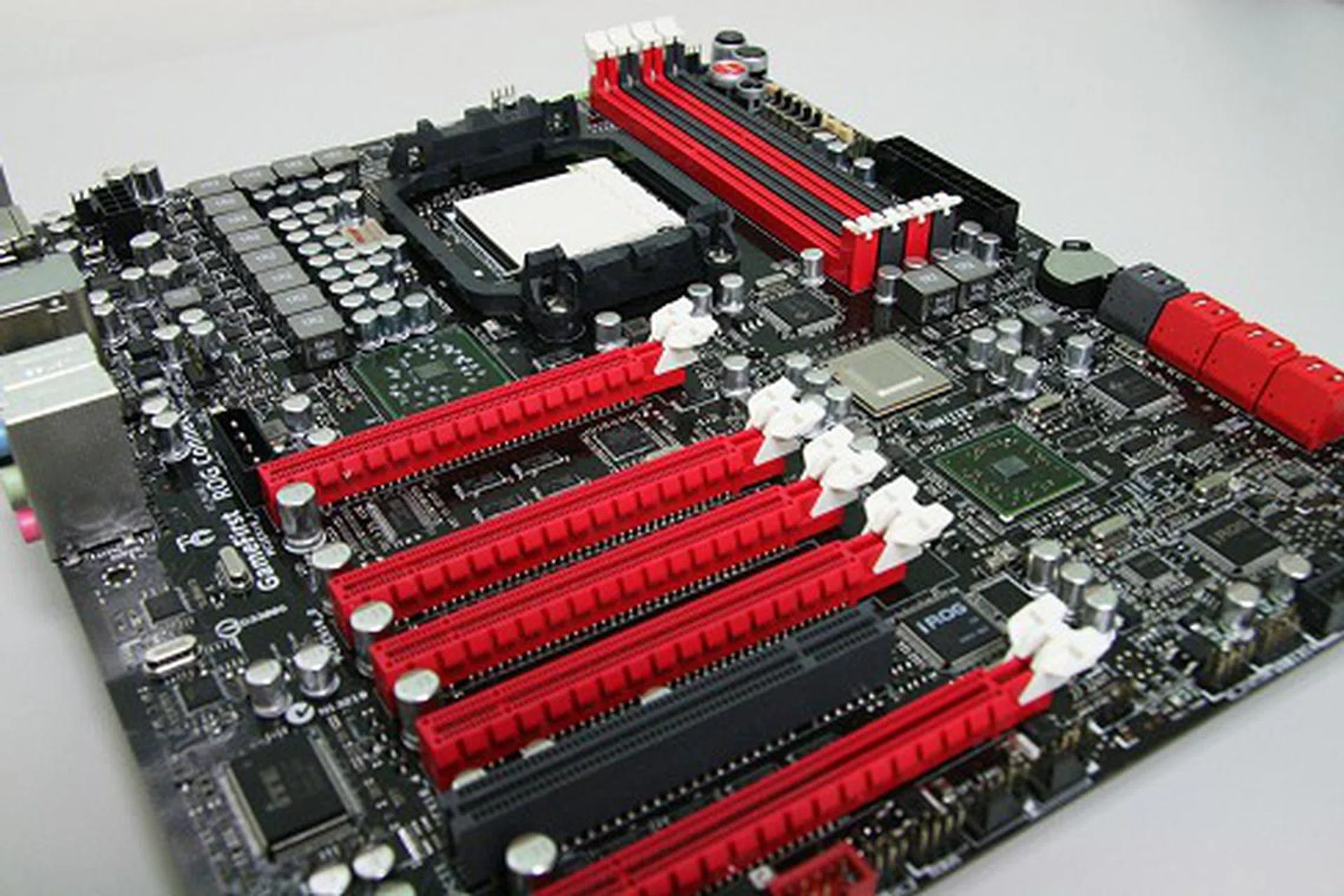 And there she is, the ASUS Crosshair IV Extreme AMD 890FX based motherboard without the cool heatsink covers on. Instead of quad PCIe x16 slots on the Formula, the Extreme goes for a total of 5.